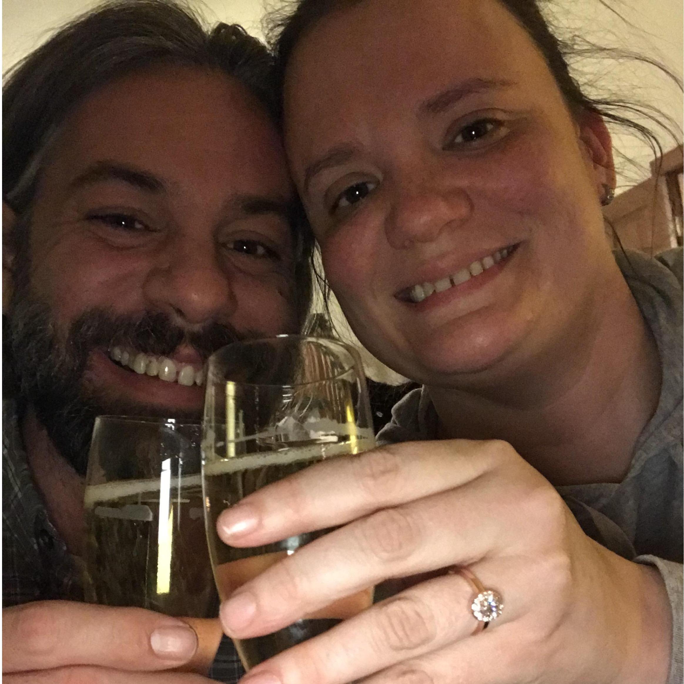 Moments after Brian proposed, toasting our engagement with champagne flutes from Amsterdam | December 30, 2017