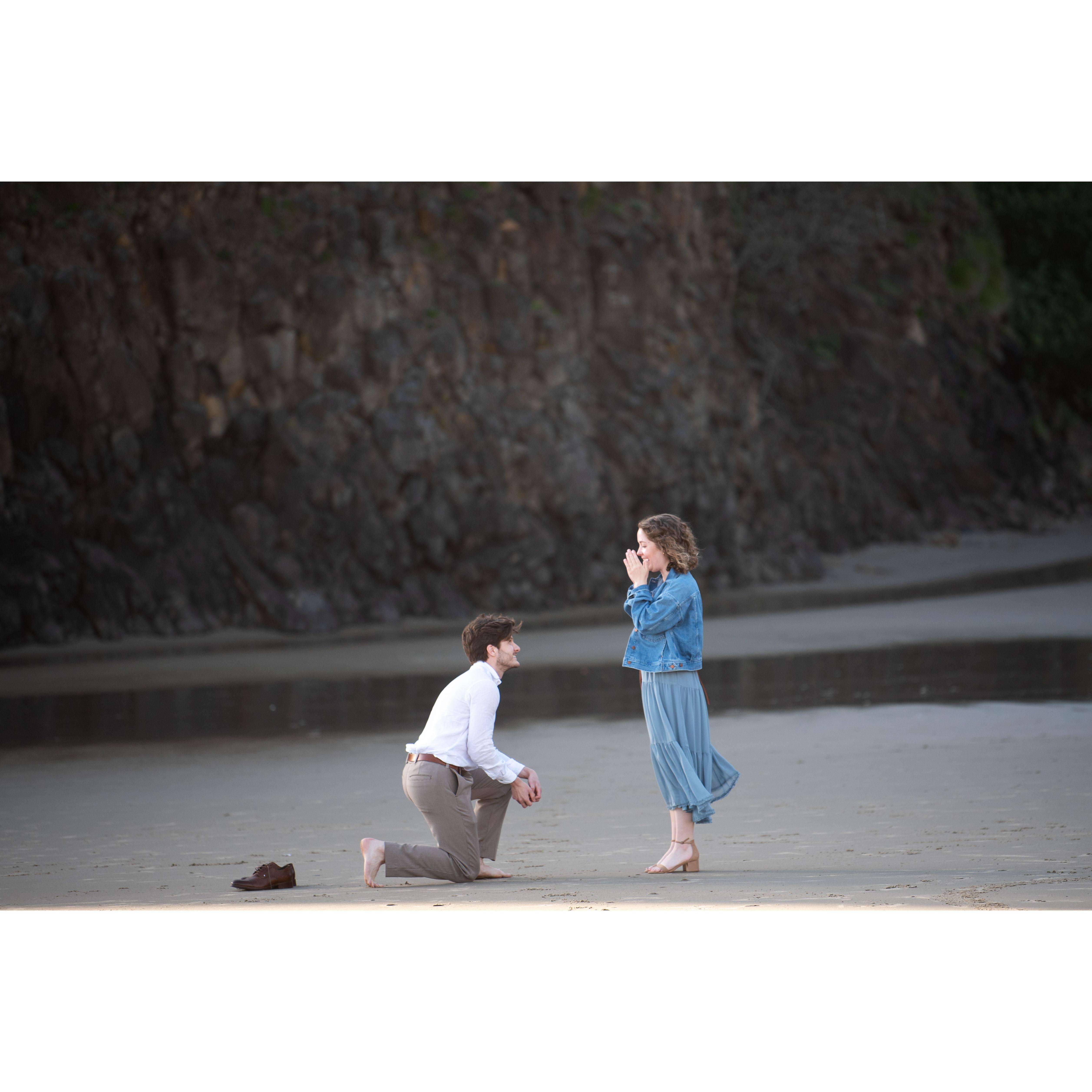 John popped the big question on a surprise trip to the Oregon Coast.