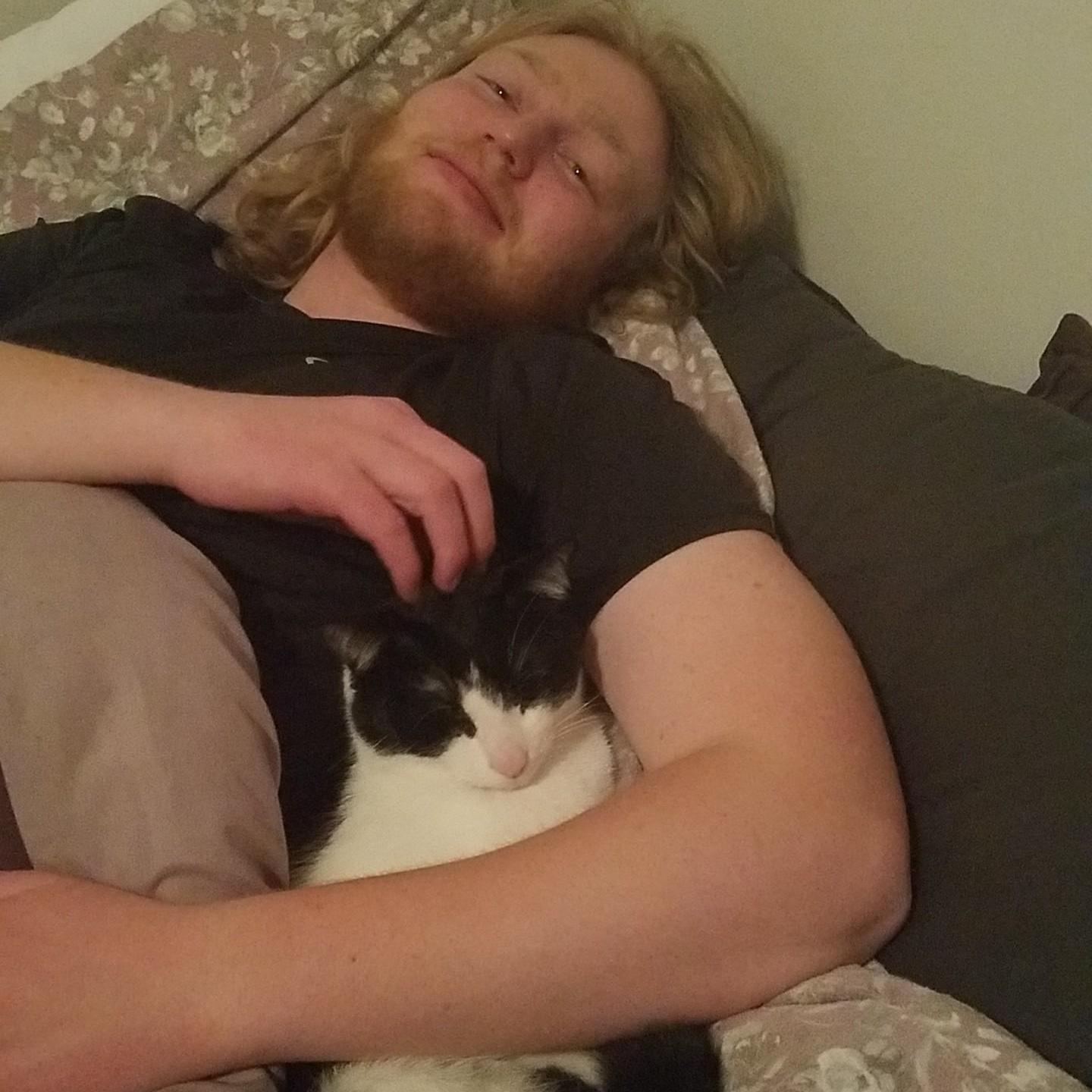 Father/kitten bonding with cat naps