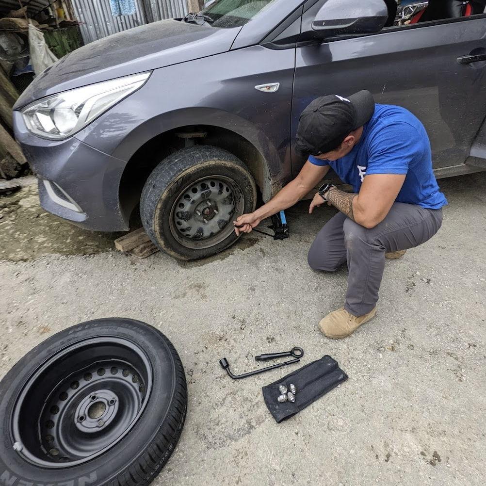 We were certain that someone popped/slashed our tires while we were galavanting. Good thing Ronelle knew how to change a tire!