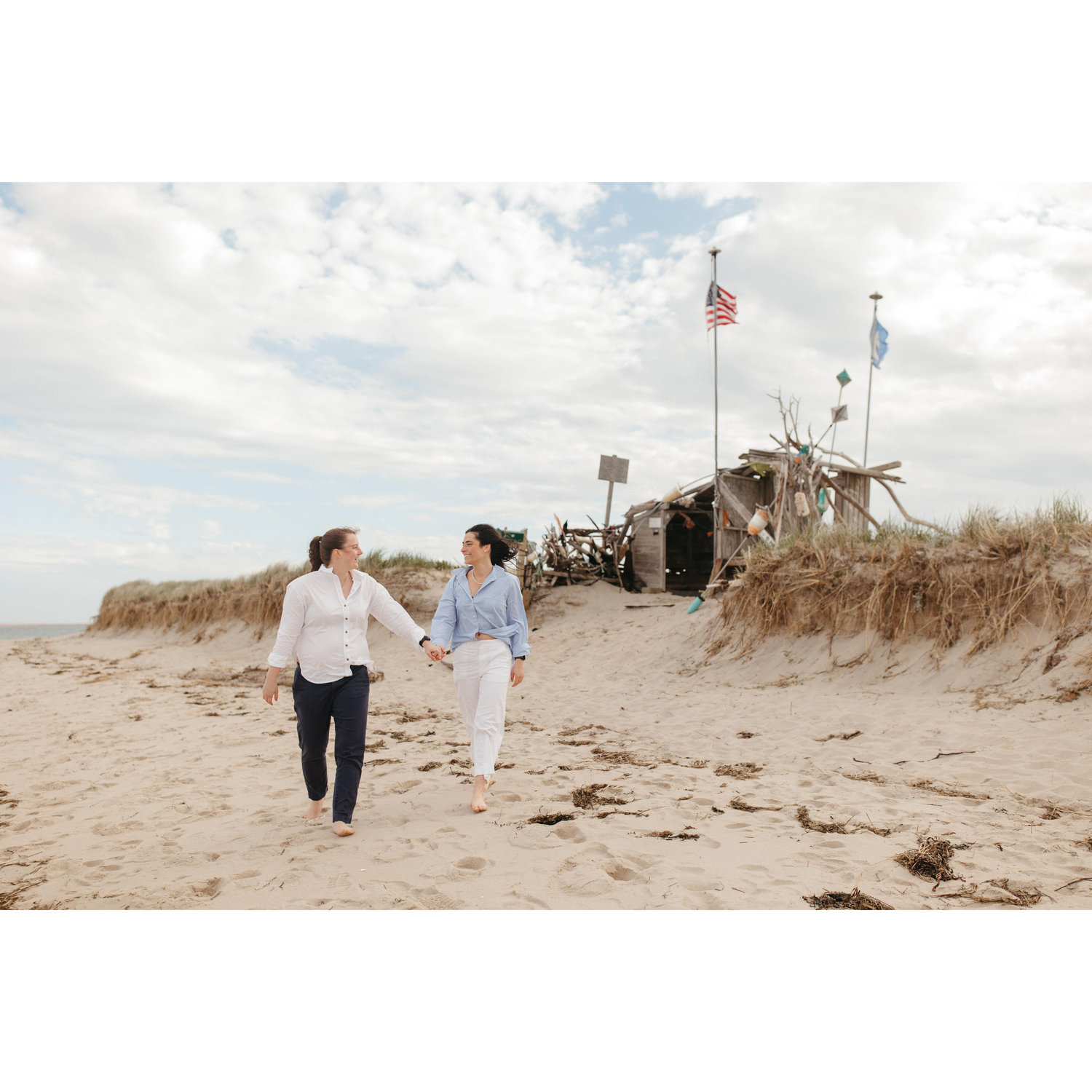 I proposed in front of the hut in on Chatham Light House beach where we vacation every summer