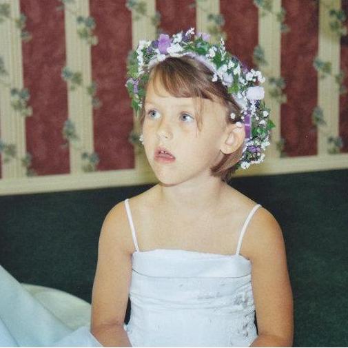 Emily, flower girl for cousin Chrystal's wedding, five years old