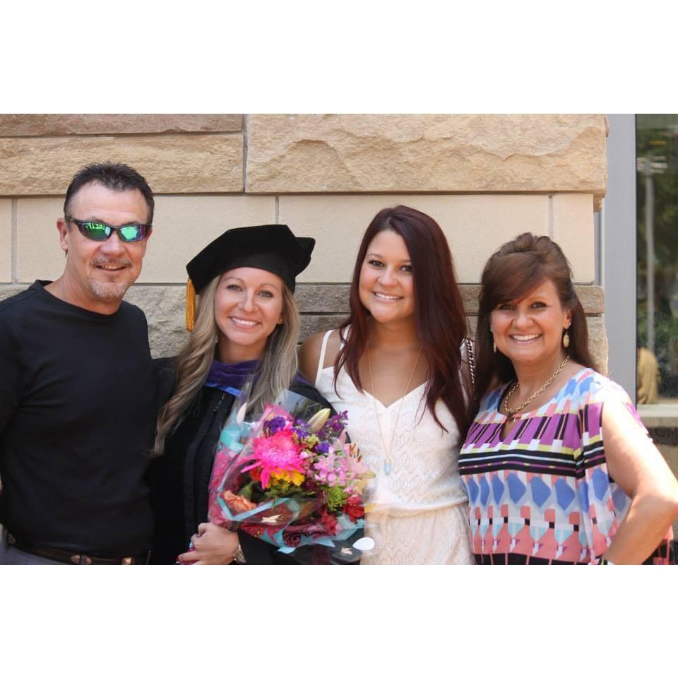 Brit's graduation from law school with her father, Craig Bragg, sister, Carly Bragg, and mother, Kim Bragg.