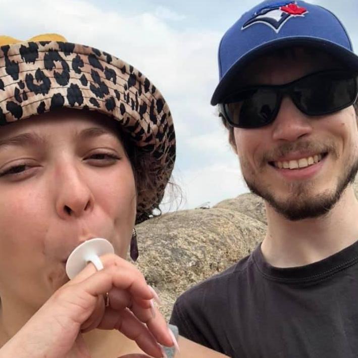 The moment after he proposed with the purple Amethyst stone earrings and the ring pop on Kruger Rock, Rocky Mountain National Forest, in Estes Park. Colorado.