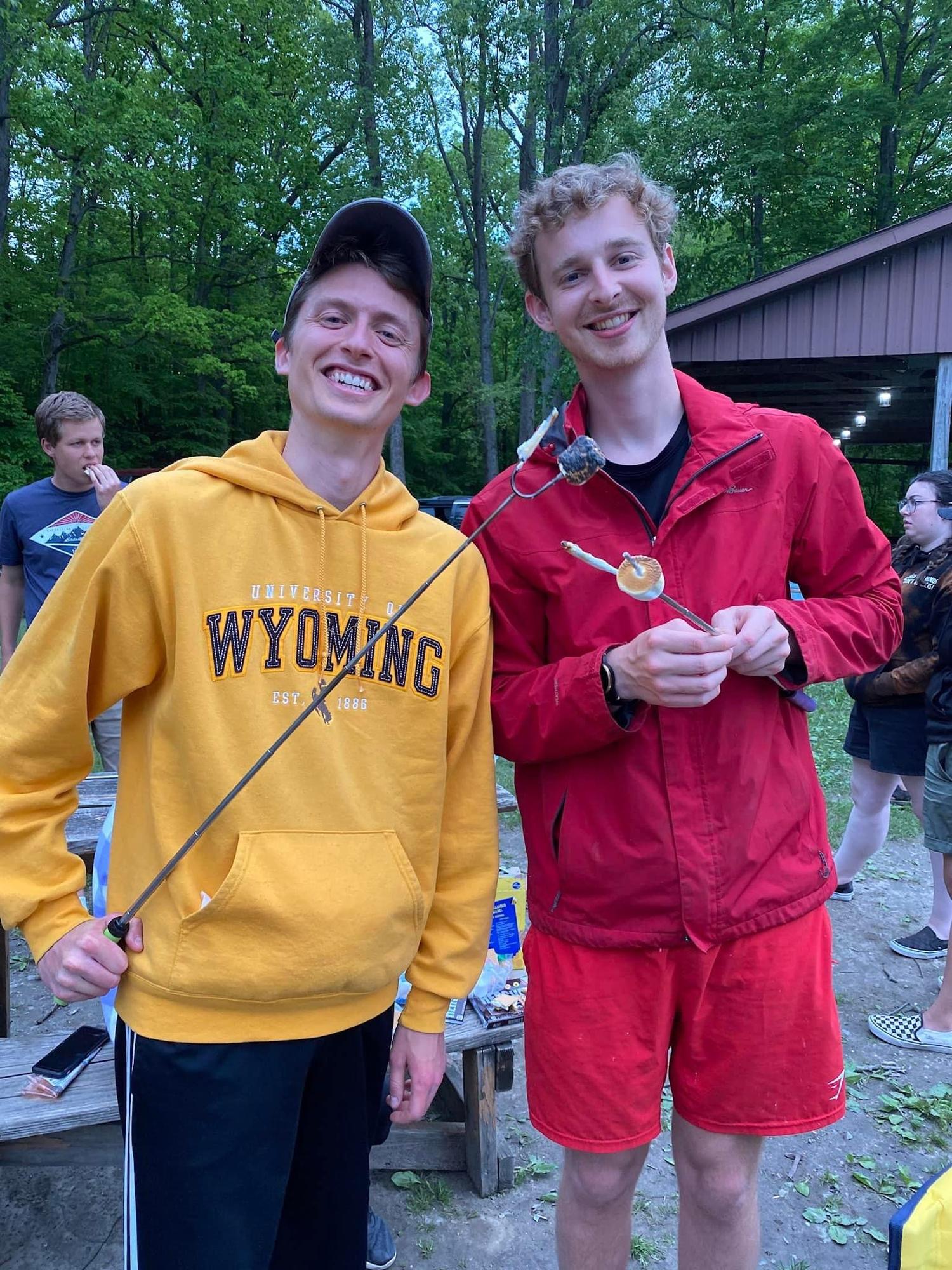 Making s’mores at Camp Lael with Justin, one of the groomsmen!