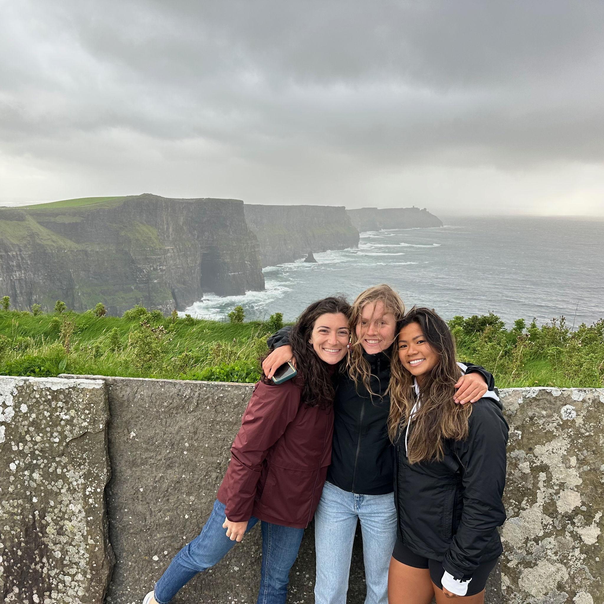 Portia, Ayla, and Ab at the Cliffs of Moher! During their Ireland biking trip.