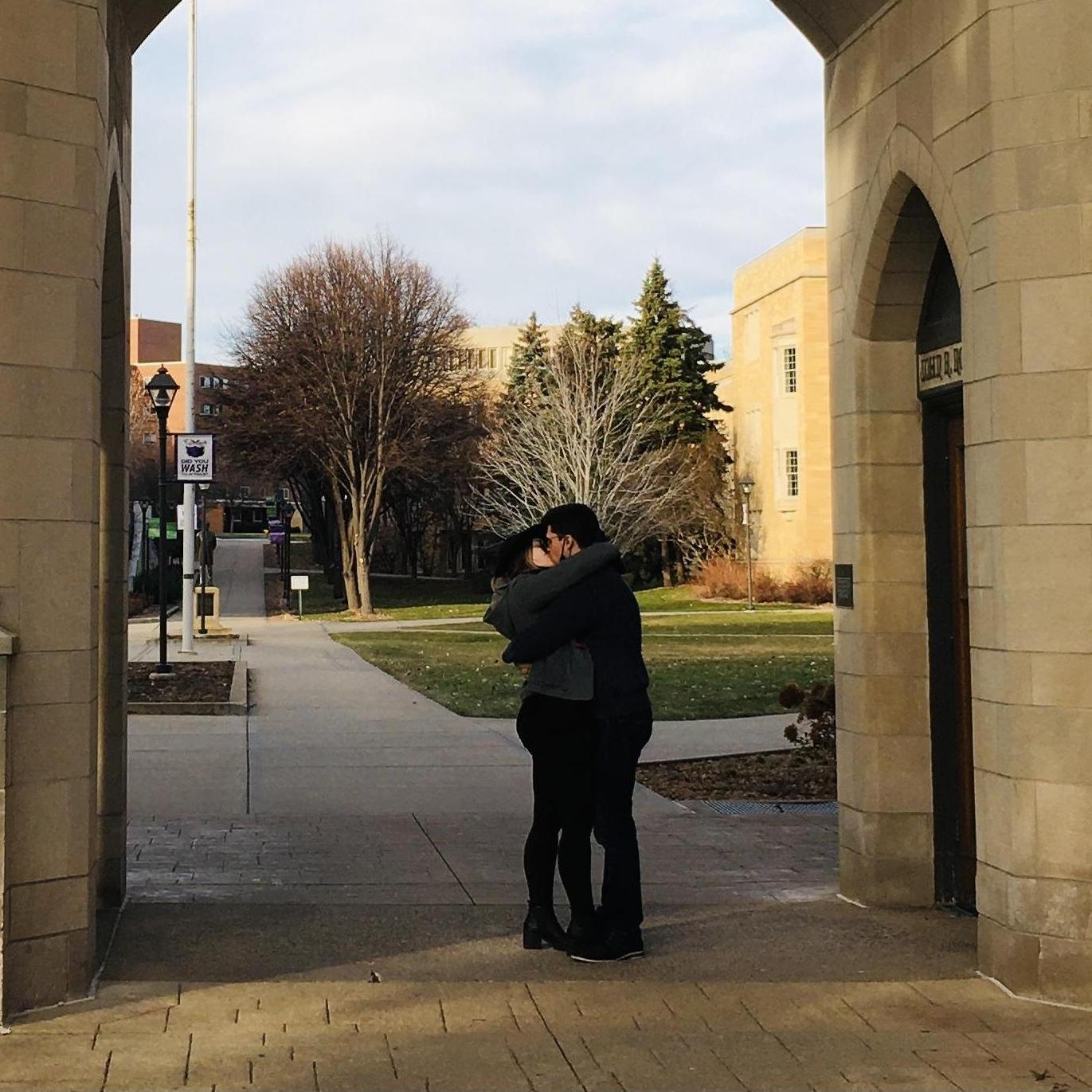Kissing under the arches at Joe's alma mater is a tradition we couldn't pass up!