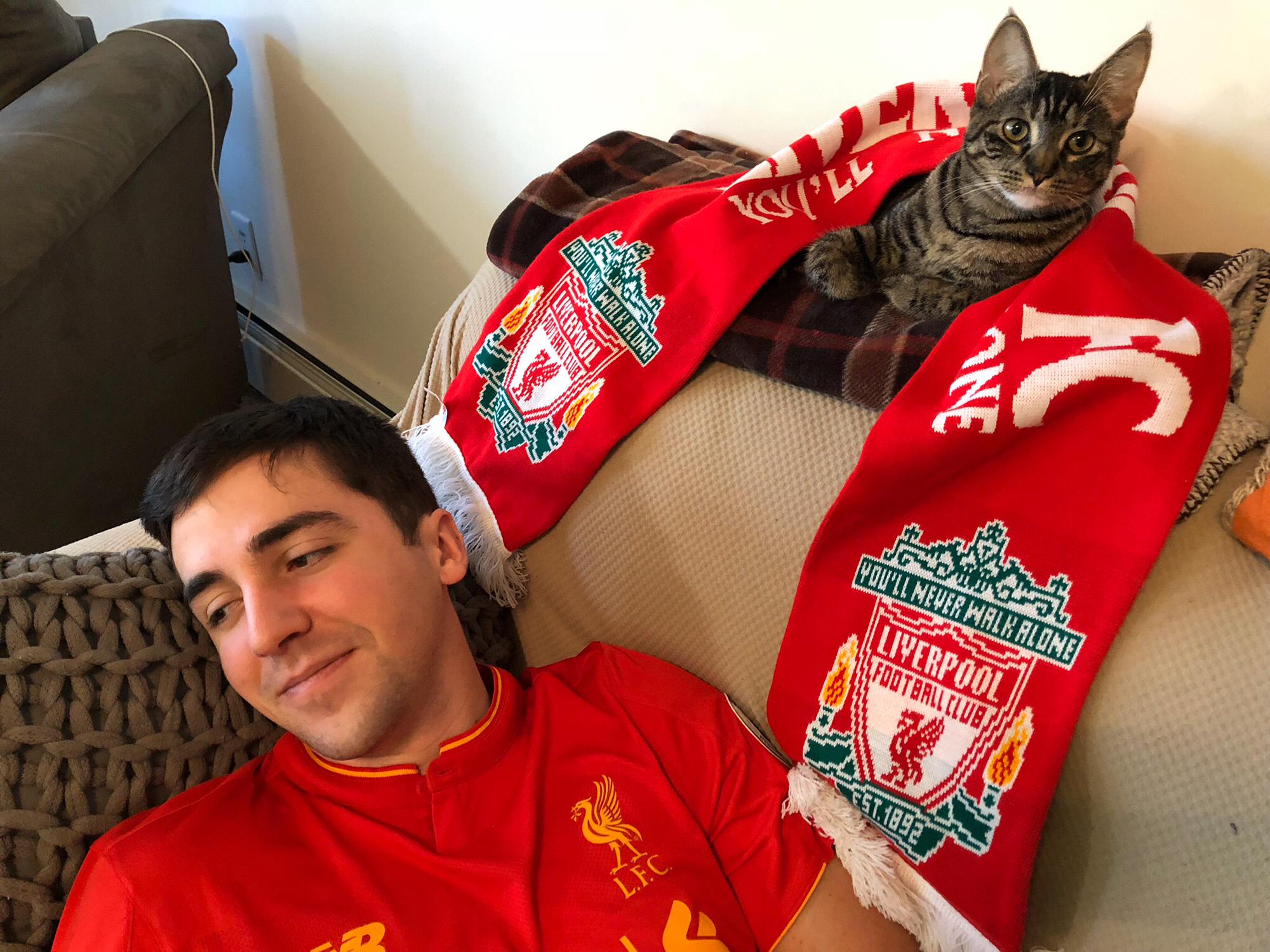 Dave and Cleo love watching Liverpool soccer games on Saturday mornings!