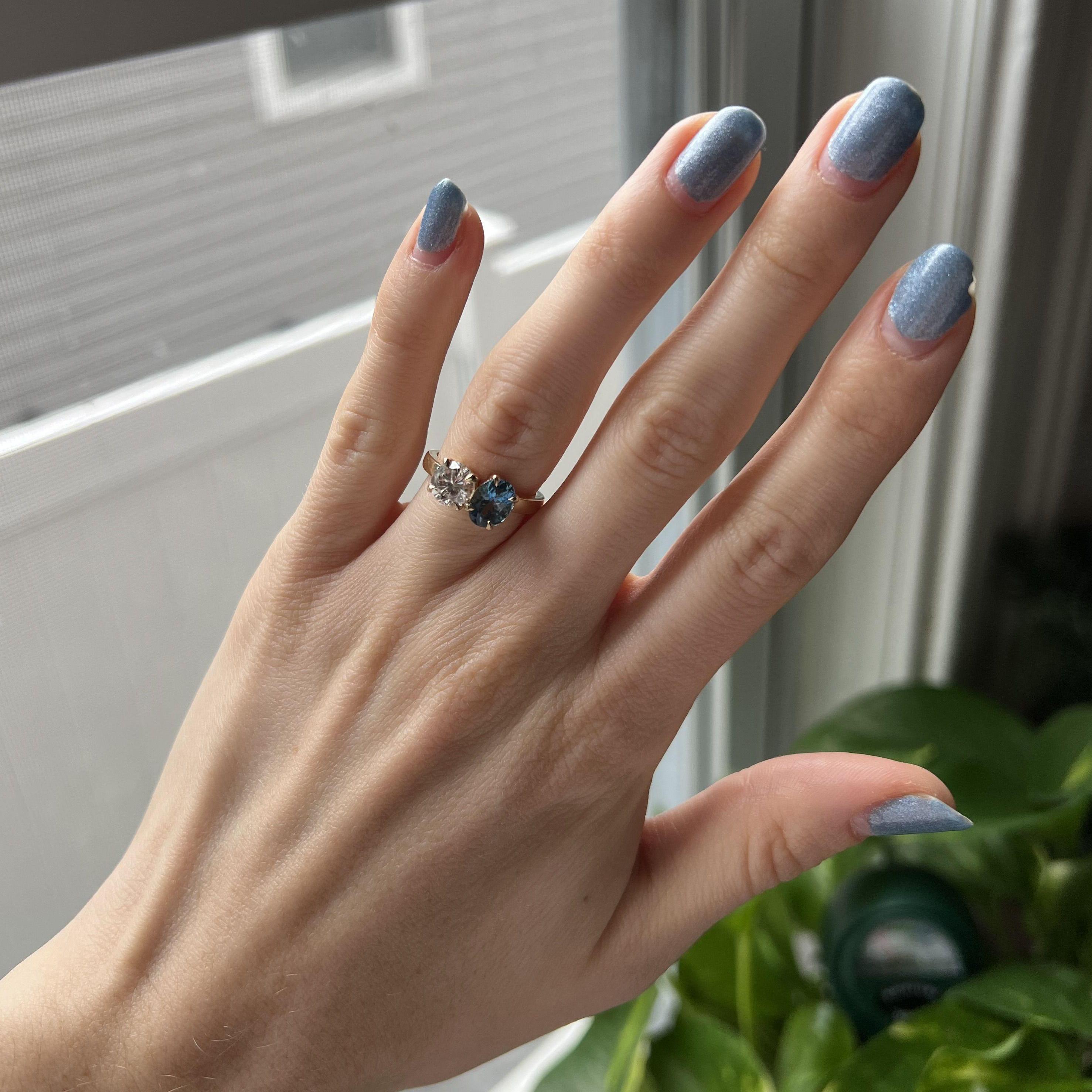 Emma's custom engagement ring, with a family diamond and an aquamarine (our March birthstone).