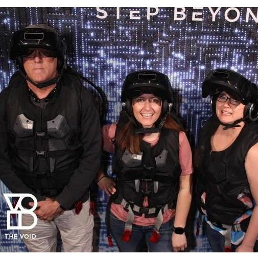 Meredith looking sassy, me looking lost and Rick looking terrified before entering the Star Wars VR in Florida