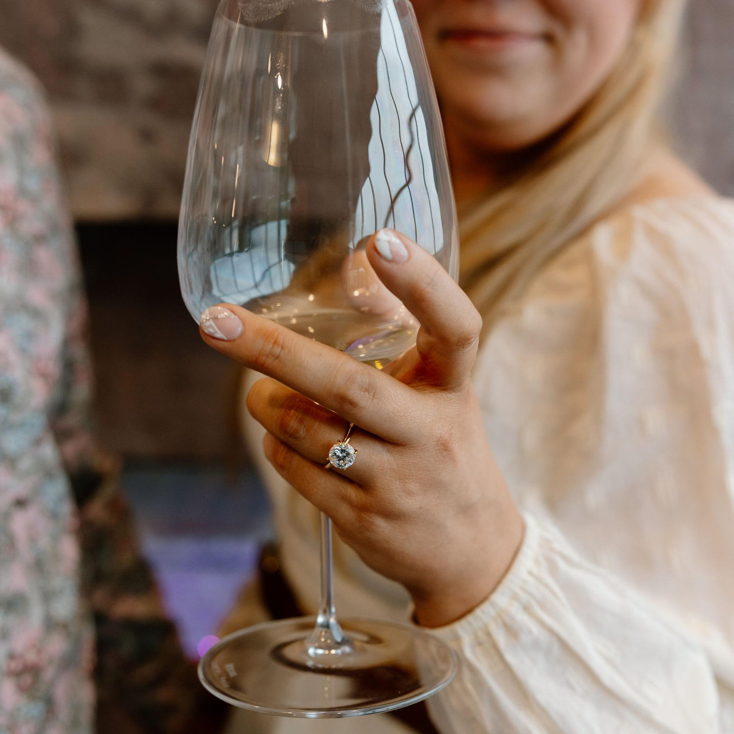 Look how beautiful that engagement ring is!