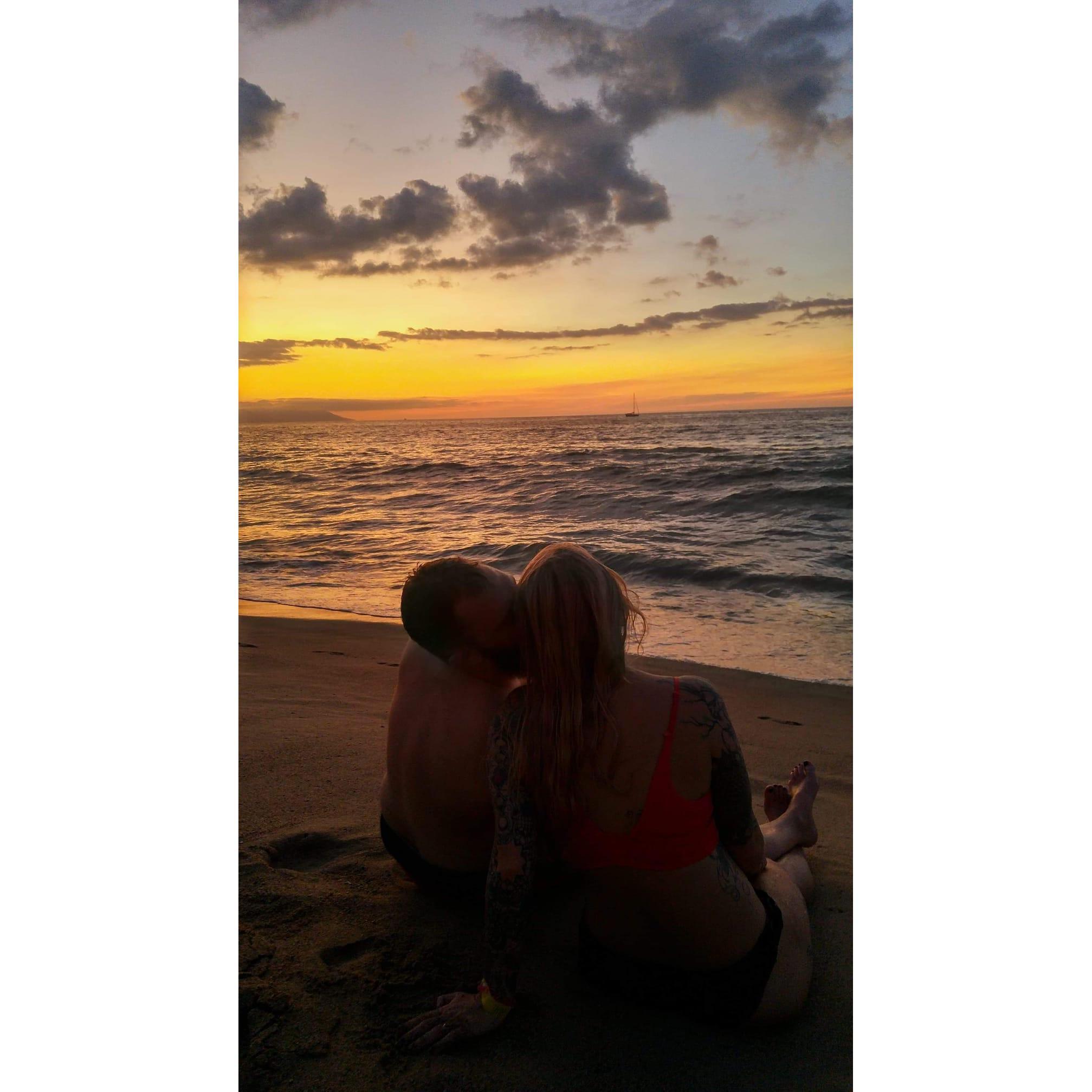 Sharing a sweet moment on the beach in Mexico