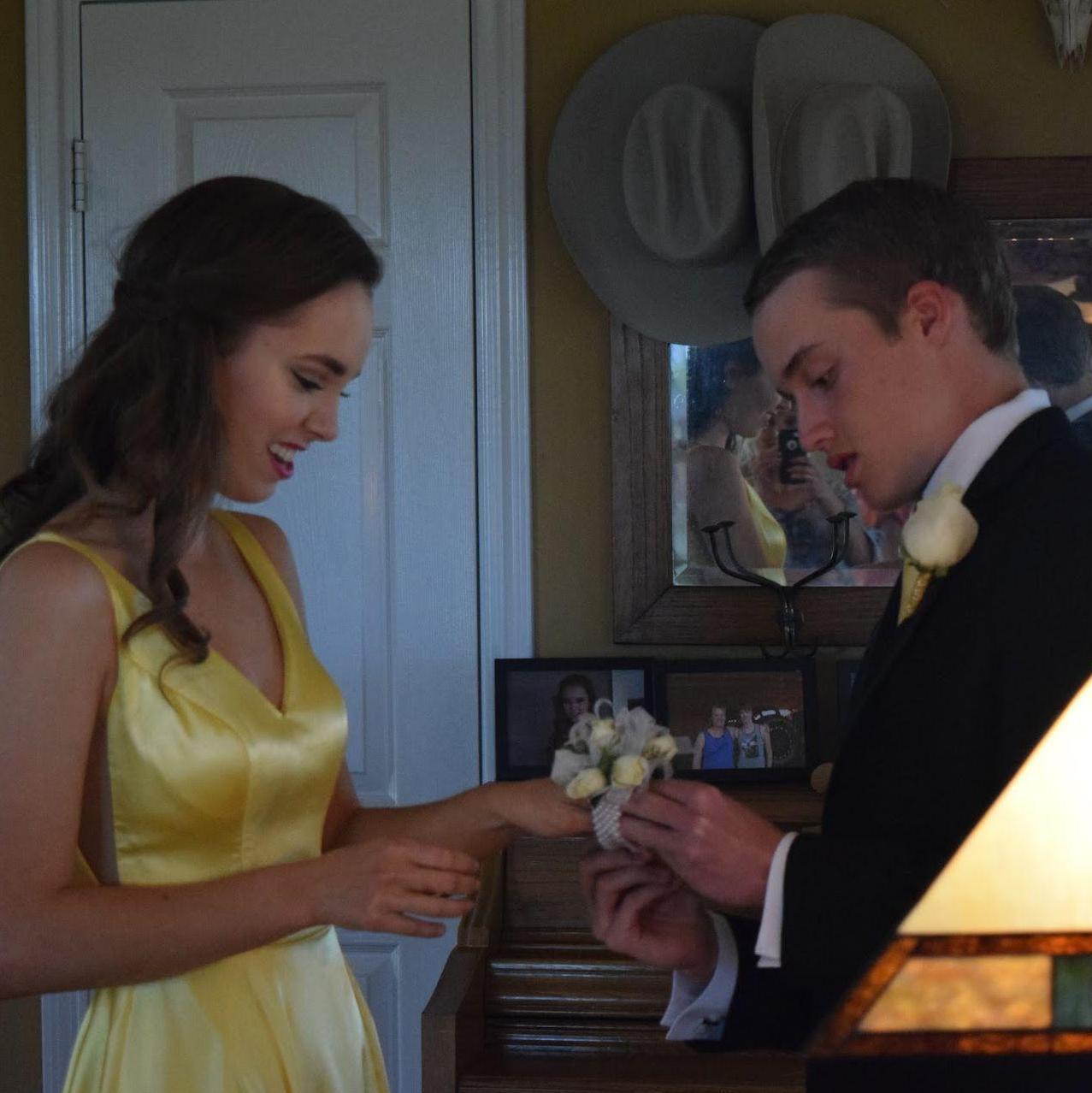 Exchanging corsage/boutonniere, Senior Prom, March 2019