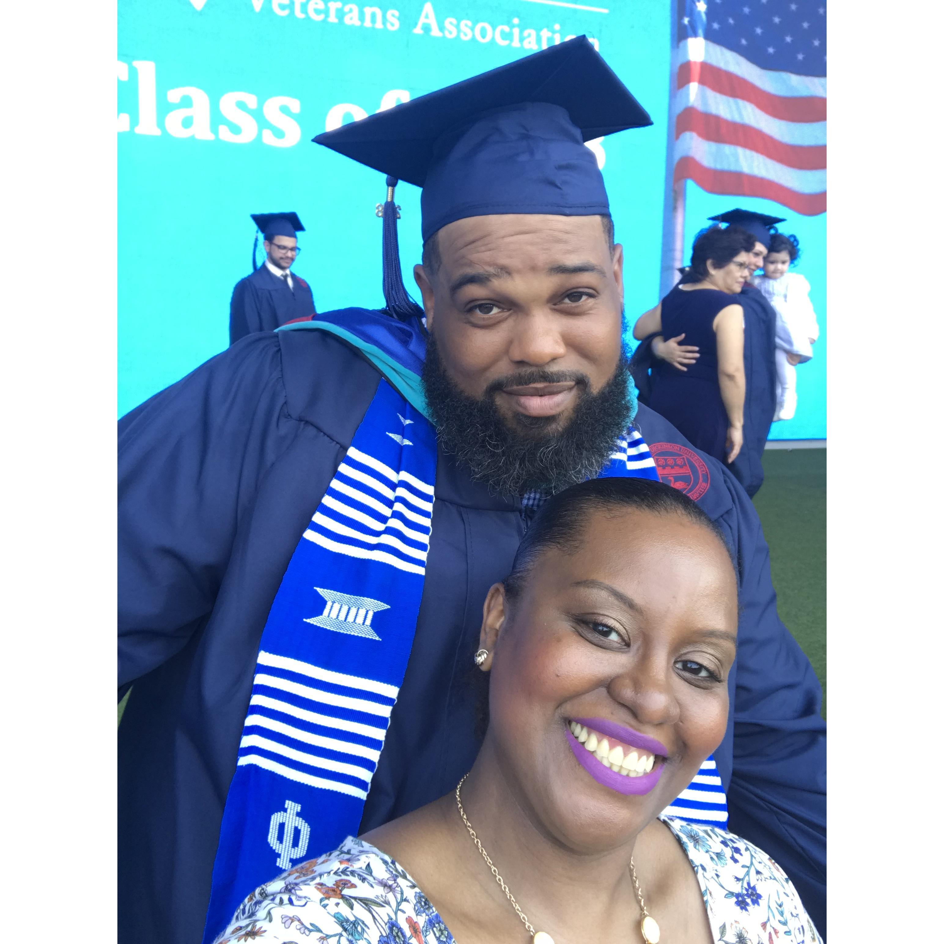 Graduating with his Masters May 2018