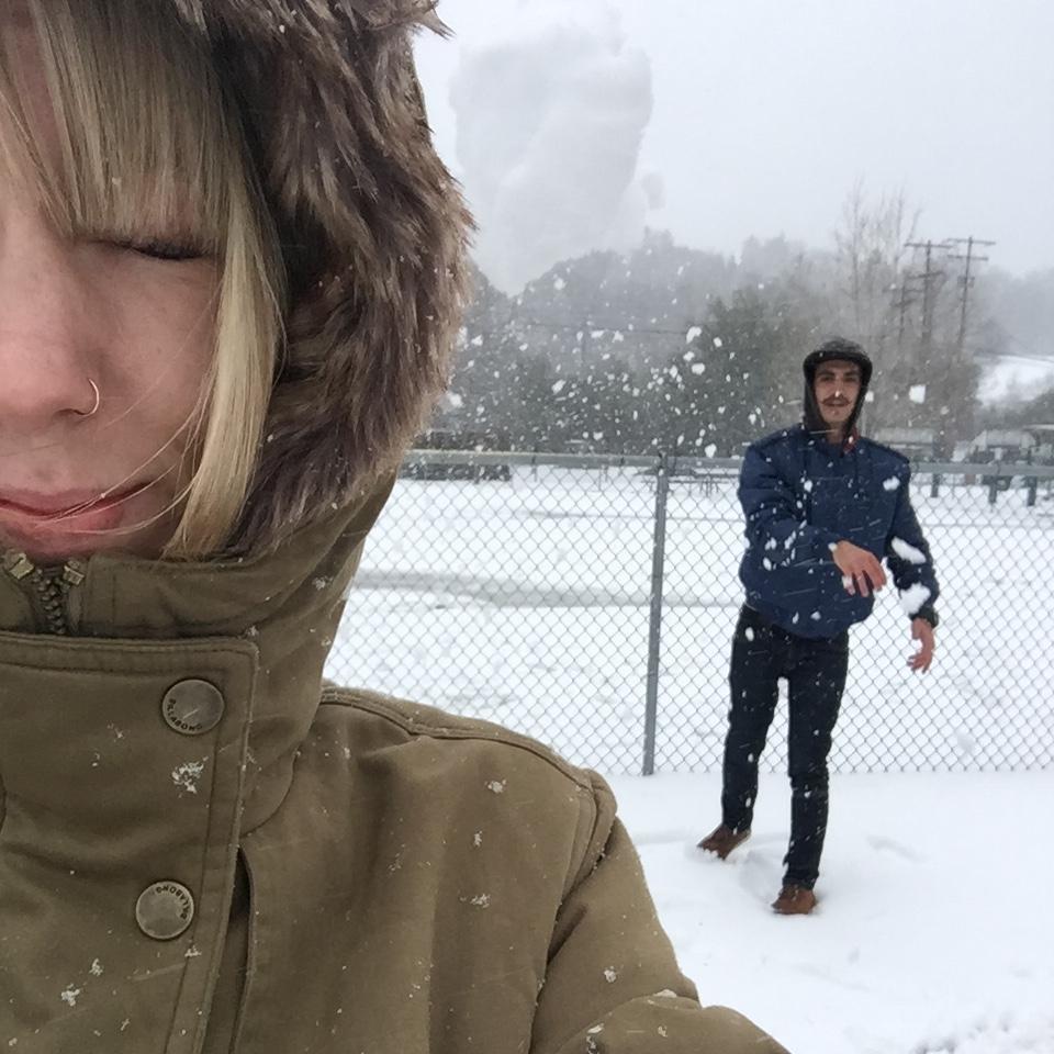 If you look closely you can see the snowball about to hit Tiff's face as she took the picture, haha!