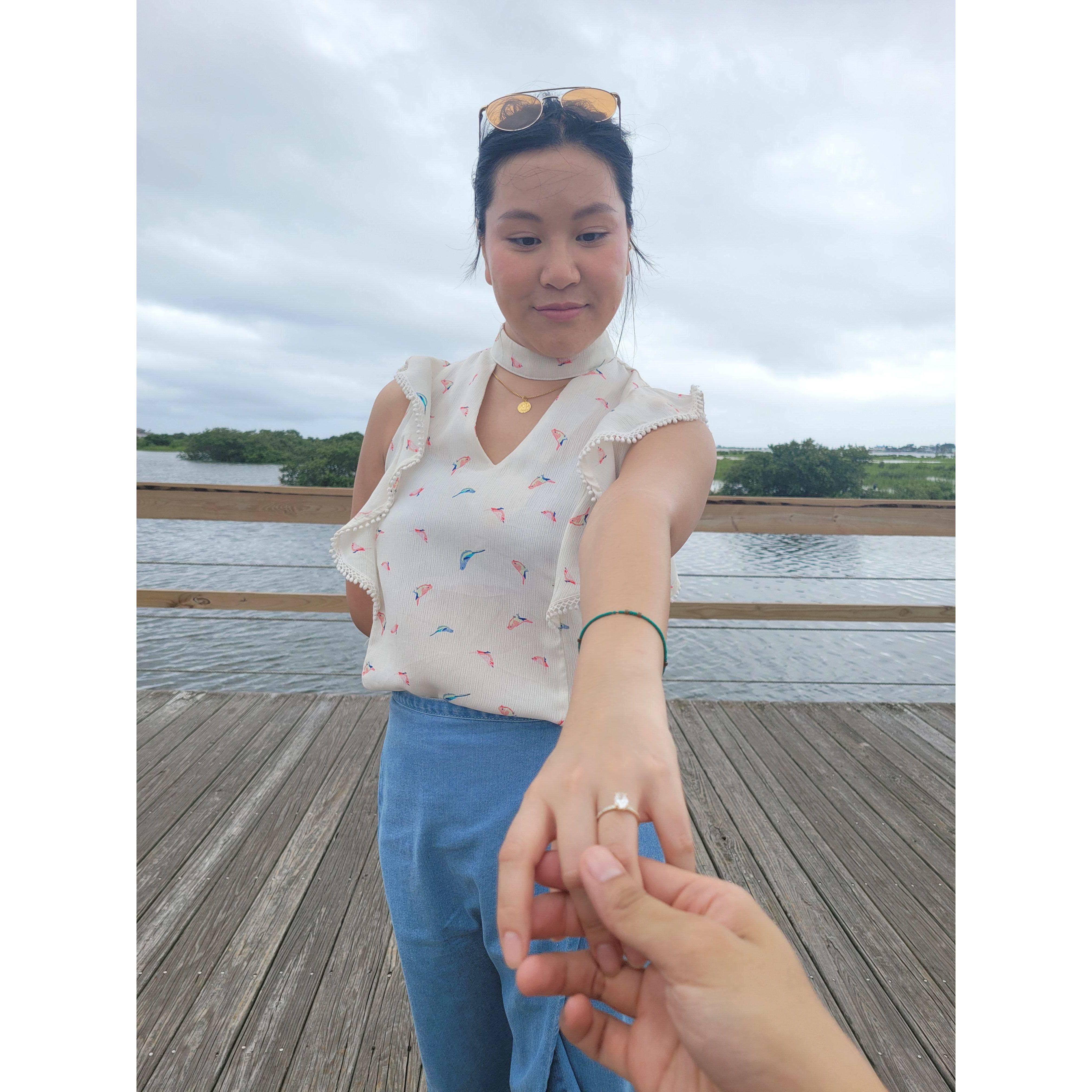 She was surprised! The ring was perfect (because she custom designed it). Her first words after he asked with the ring was "Thank you" and smiled widely. It was her dream come true!