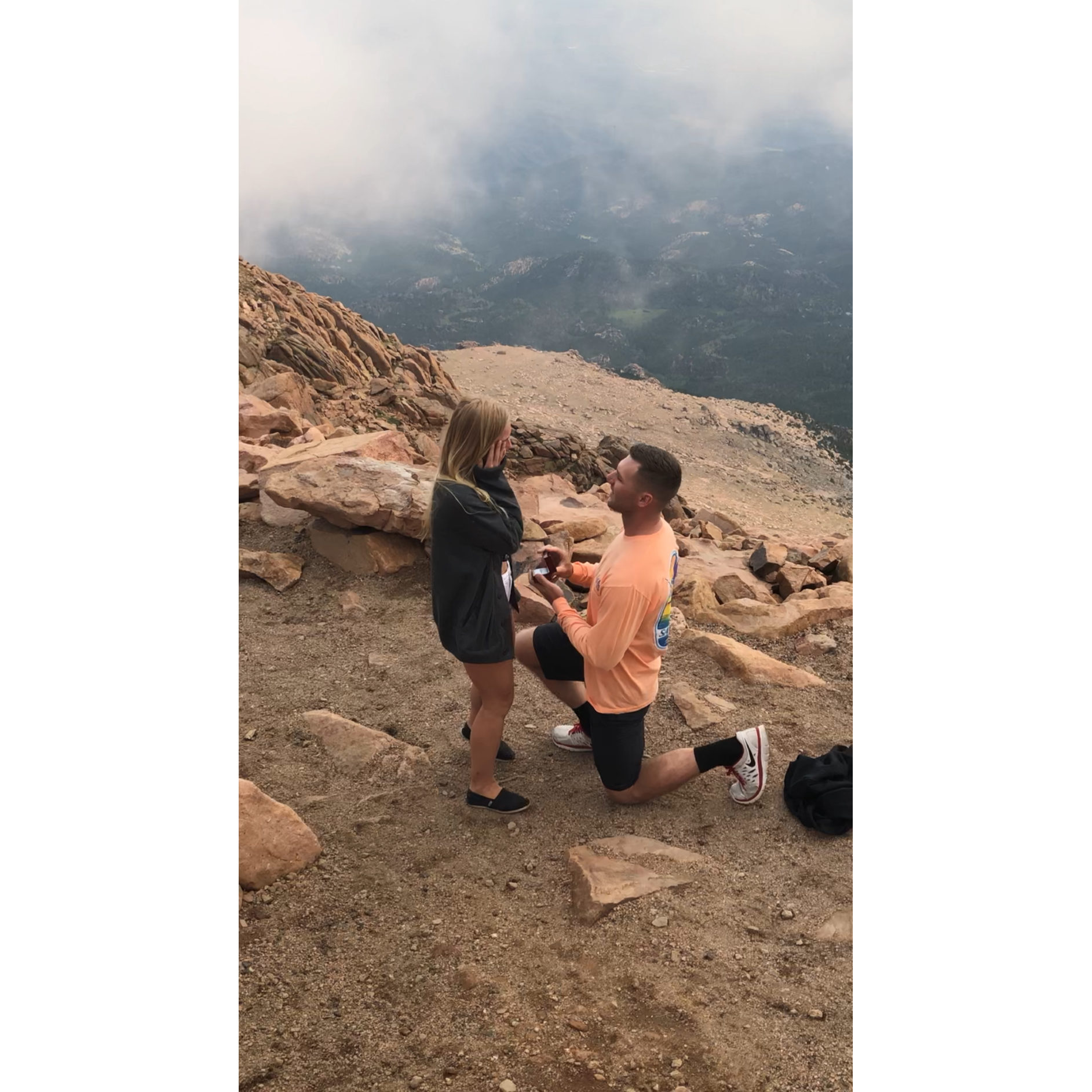We engaged on top of Pikes Peak Colorado! High on Love!
