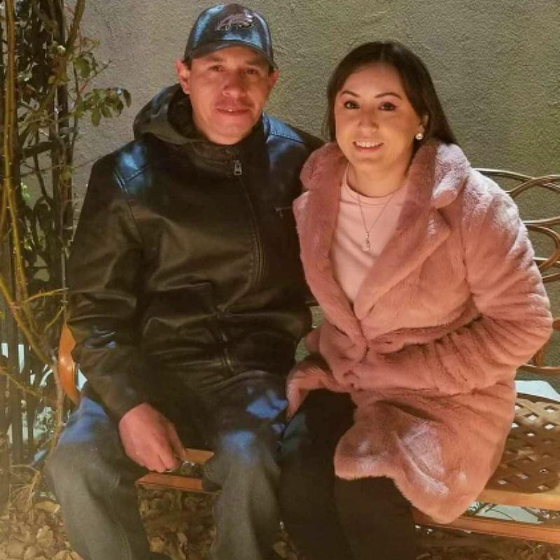 The day we got engaged later on at the Amarillo Botanical Gardens looking at the Christmas lights display