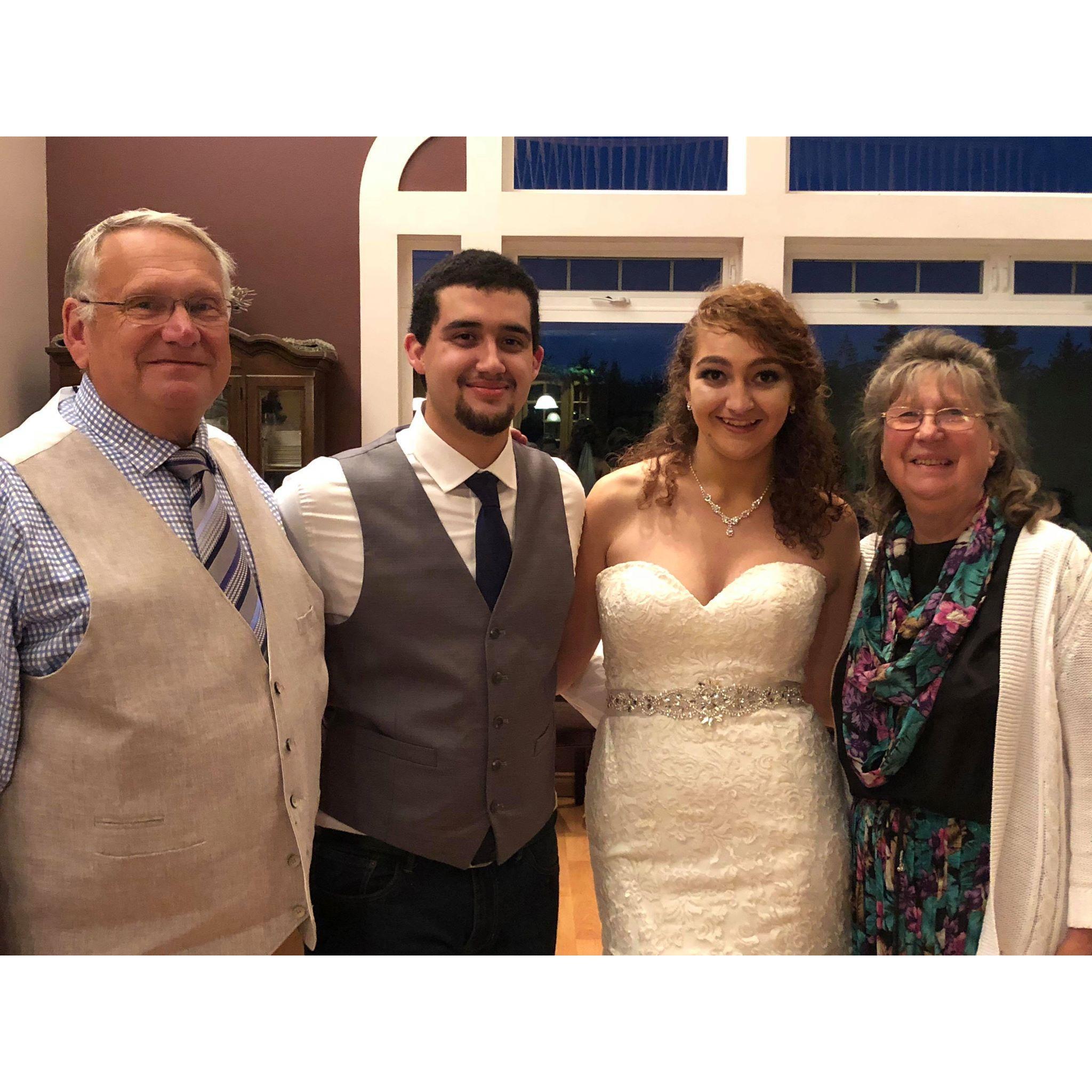 Grandma and Grandpa Thomas with bride and groom