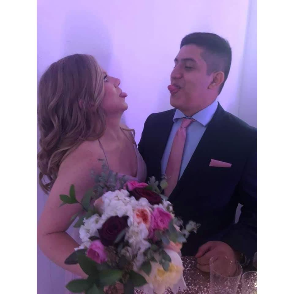 Kylie and Jose being silly at Kylie's brother's wedding!