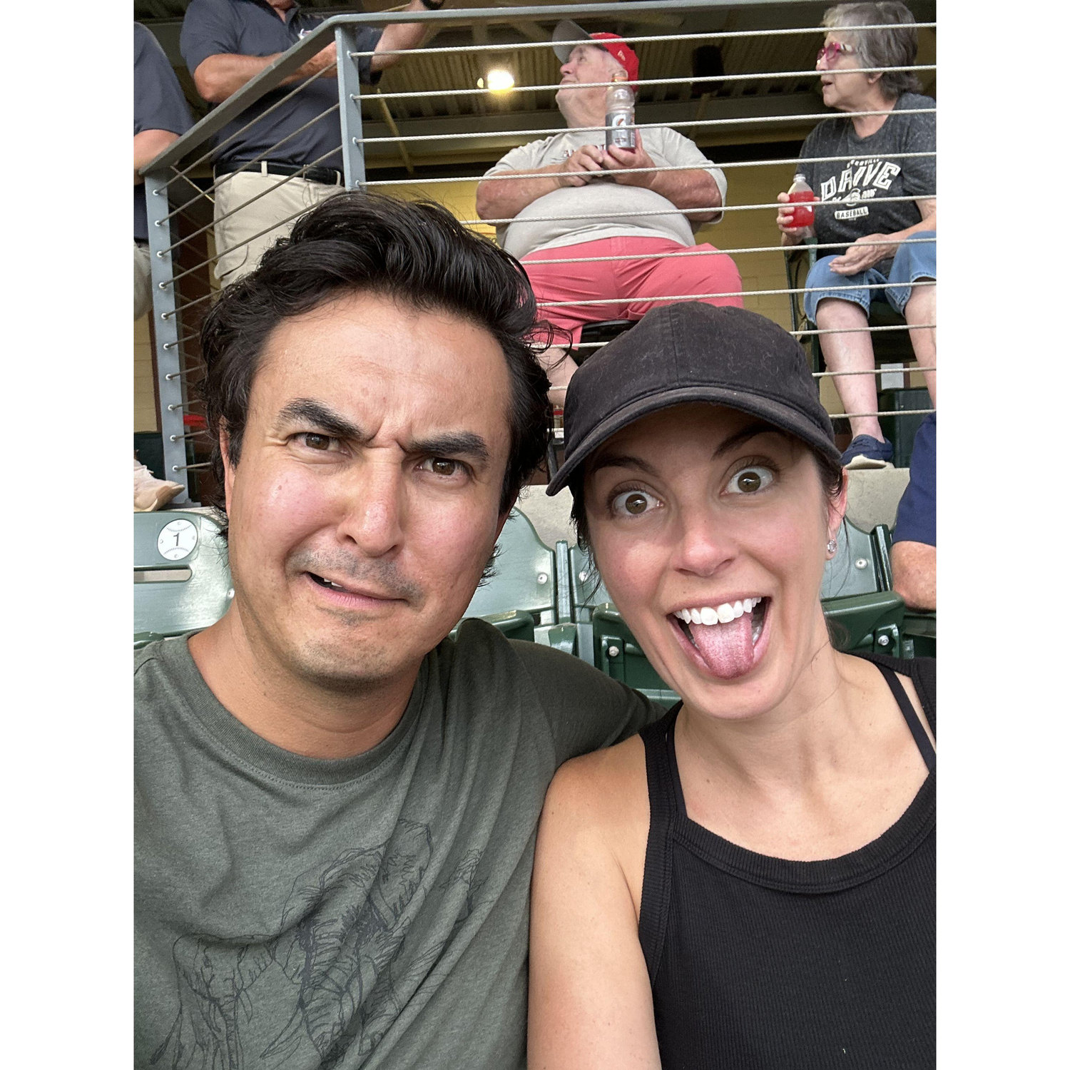 Having fun at a minor league baseball game…Go Greenville Drive!