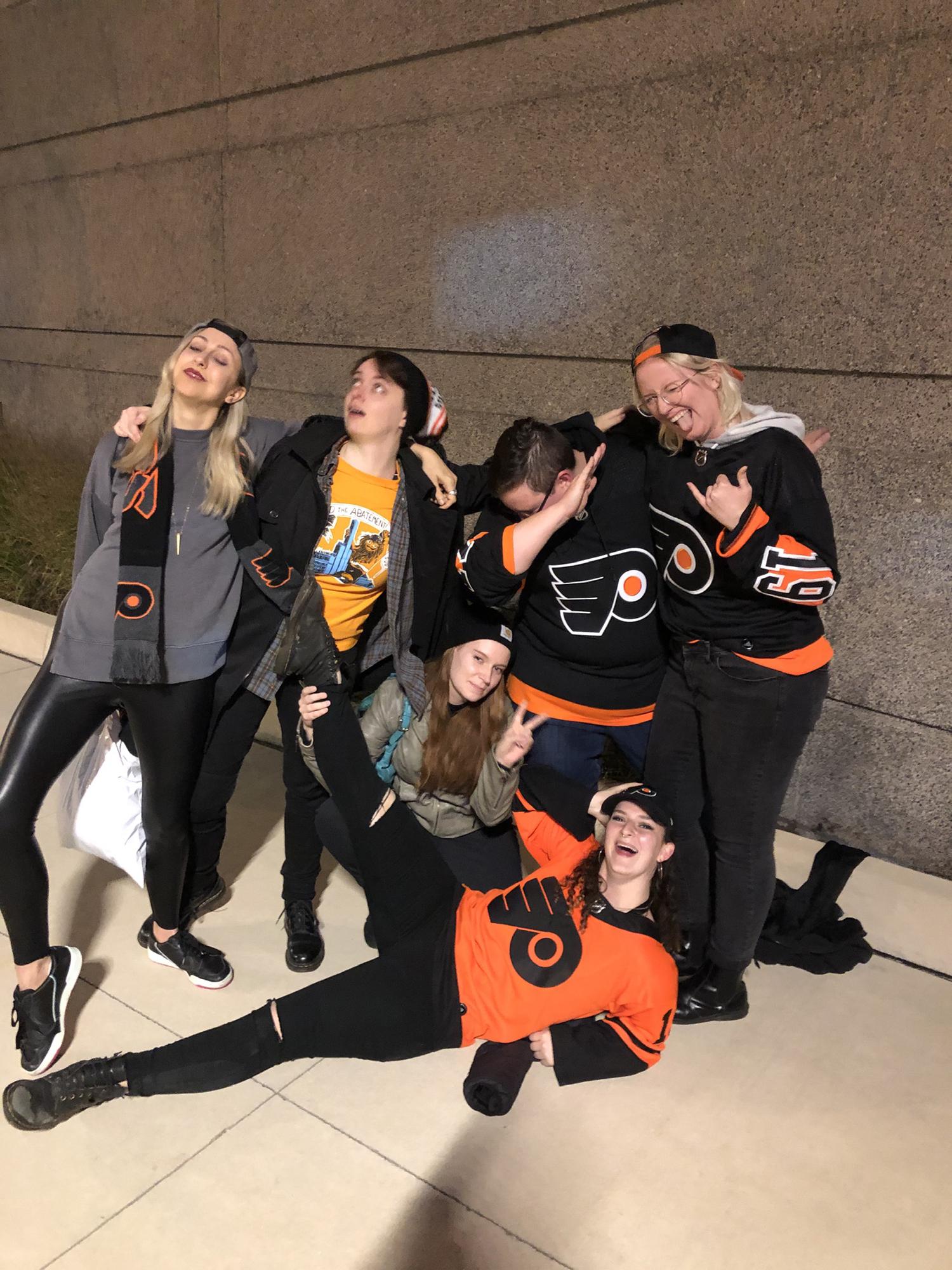 Together with friends (including El, our officiant) at that infamous first hockey game.