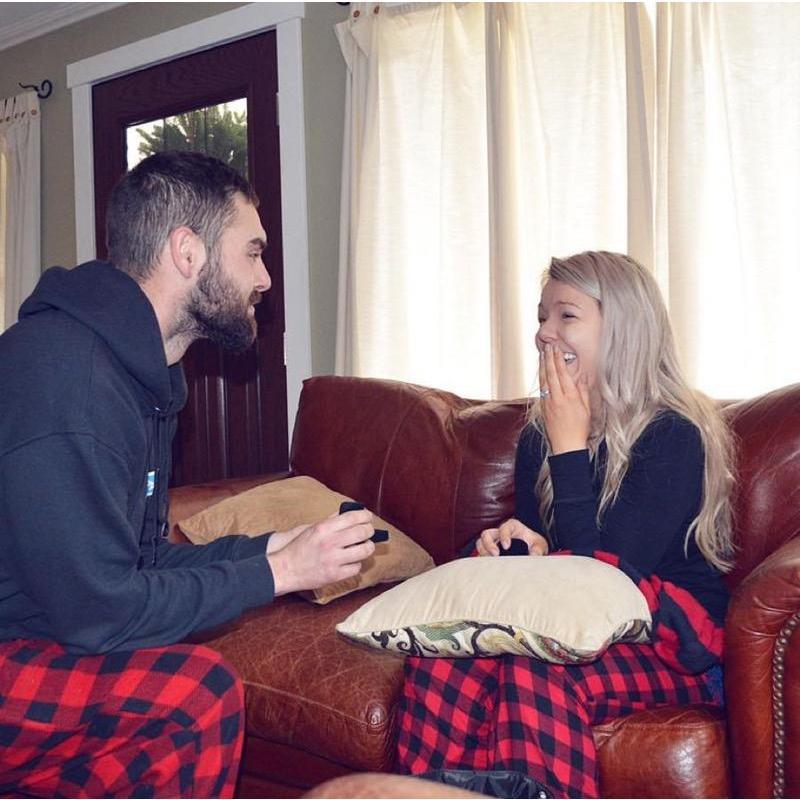 Bryce proposing to Ivy Christmas morning 2018