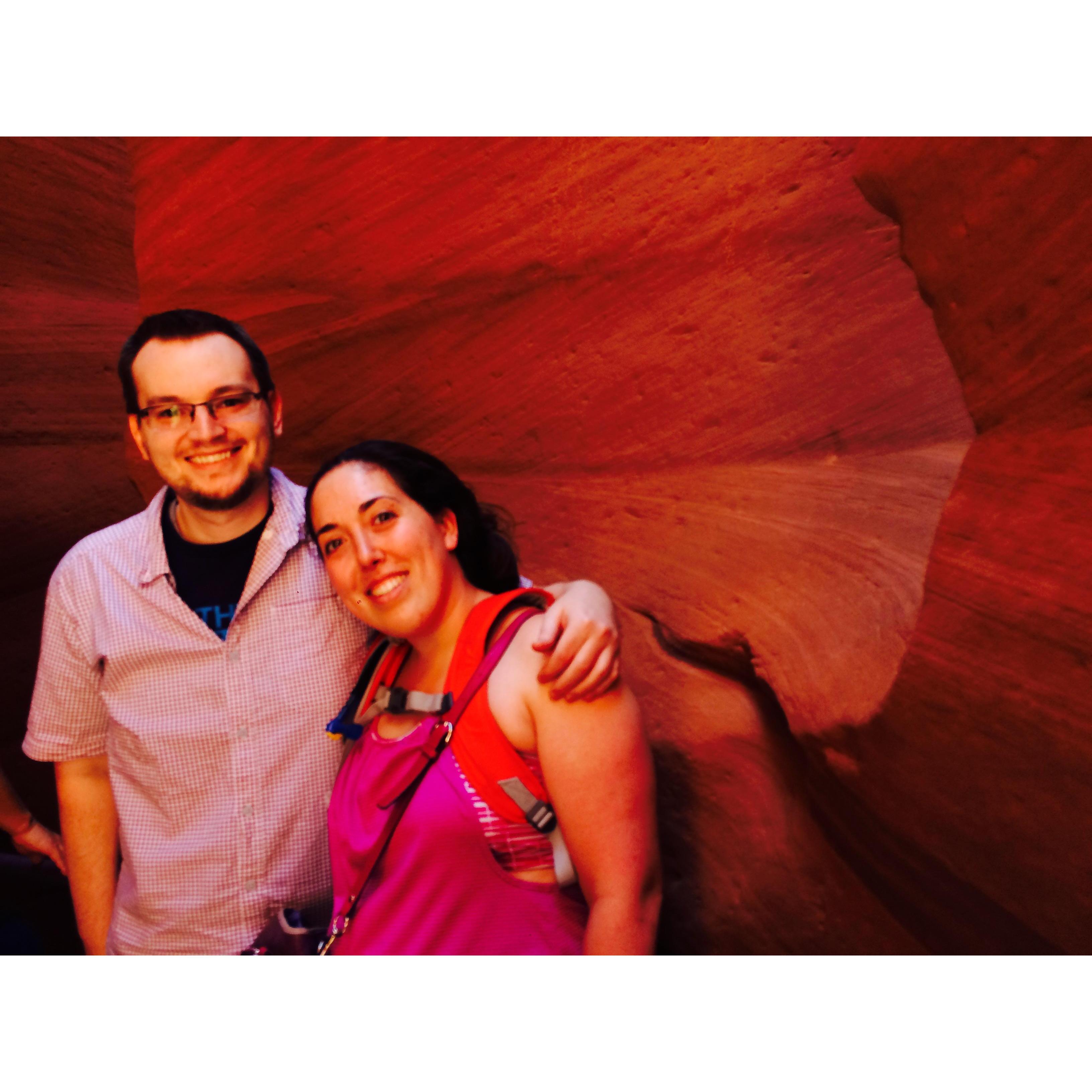This photo is from last year. We went on a road trip to see Antelope Canyon. We hiked through this sinuous slot canyon. We hope you get the chance to visit it too when you come to our wedding!