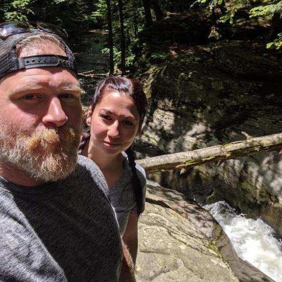 On top of Sullivan Falls during a visit to Bryce's hometown