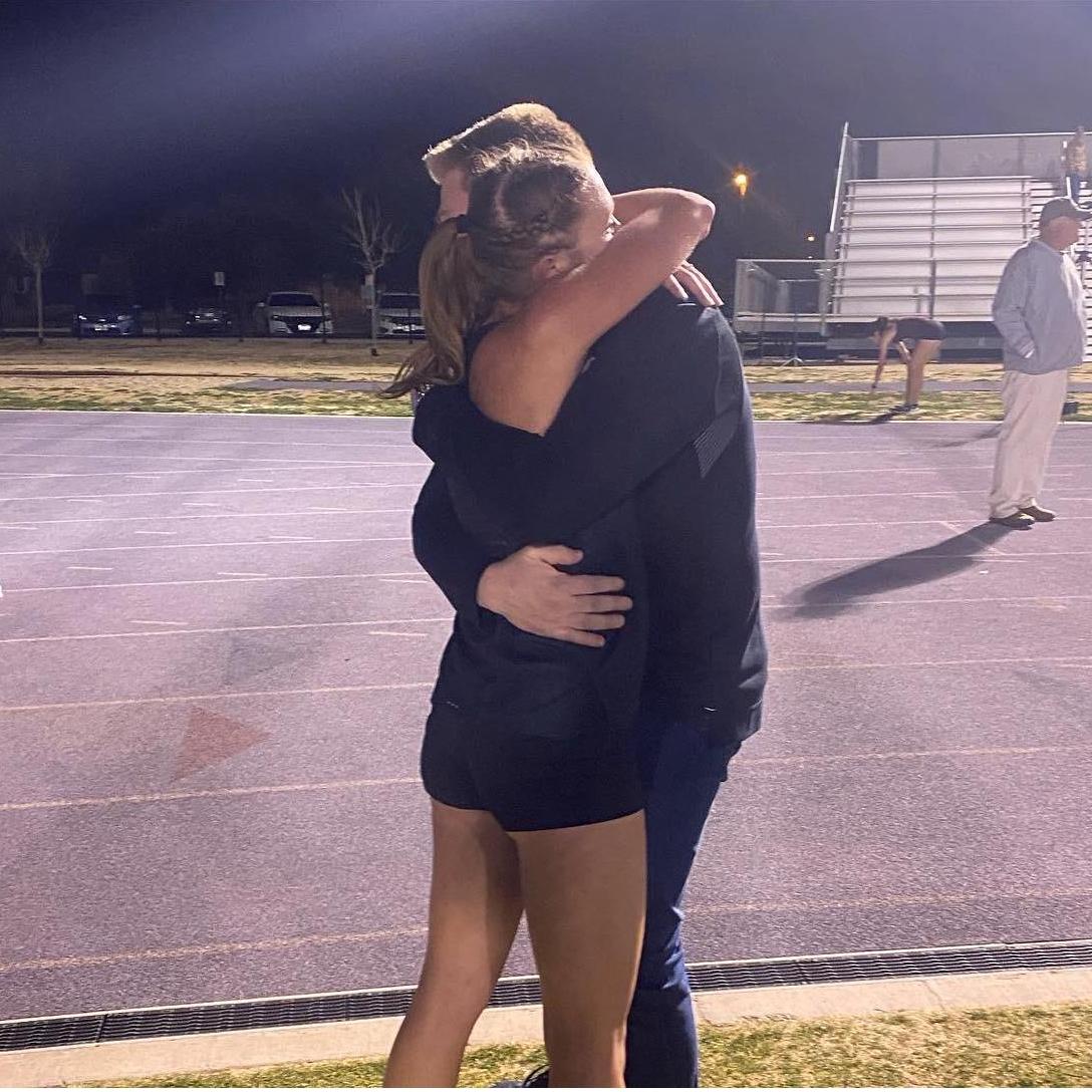 The moment after Sarah's season's-opener, a 5k race that Justin was able to see. He was able to cheer her on which led her to a major personal best and first place finish! March 18, 2022
