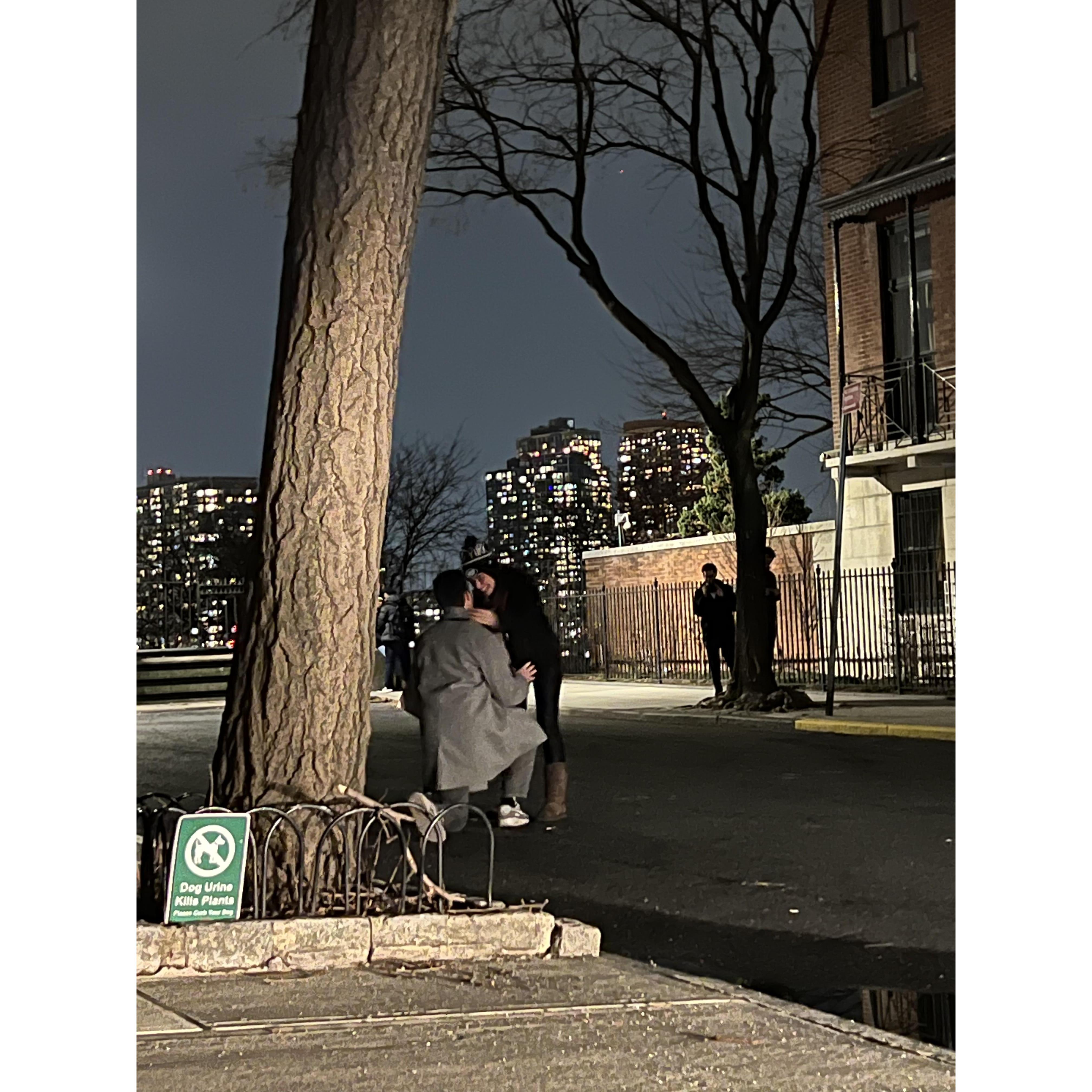 The proposal - Bennett surprising Julia with a 4 piece New Orleans style band playing "Uptown Funk" and "Somewhere Over the Rainbow" (two of her favorites) before getting down on one knee.