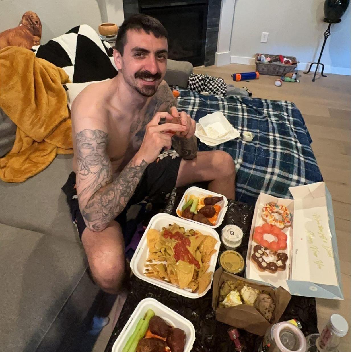 Sara brought Kolby home a Door Dash feast! This is true love!