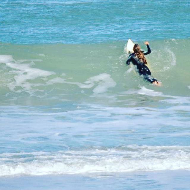 Anna introduced him to the world of surfing.
