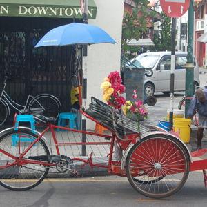 Romantic trishaw ride through George Town