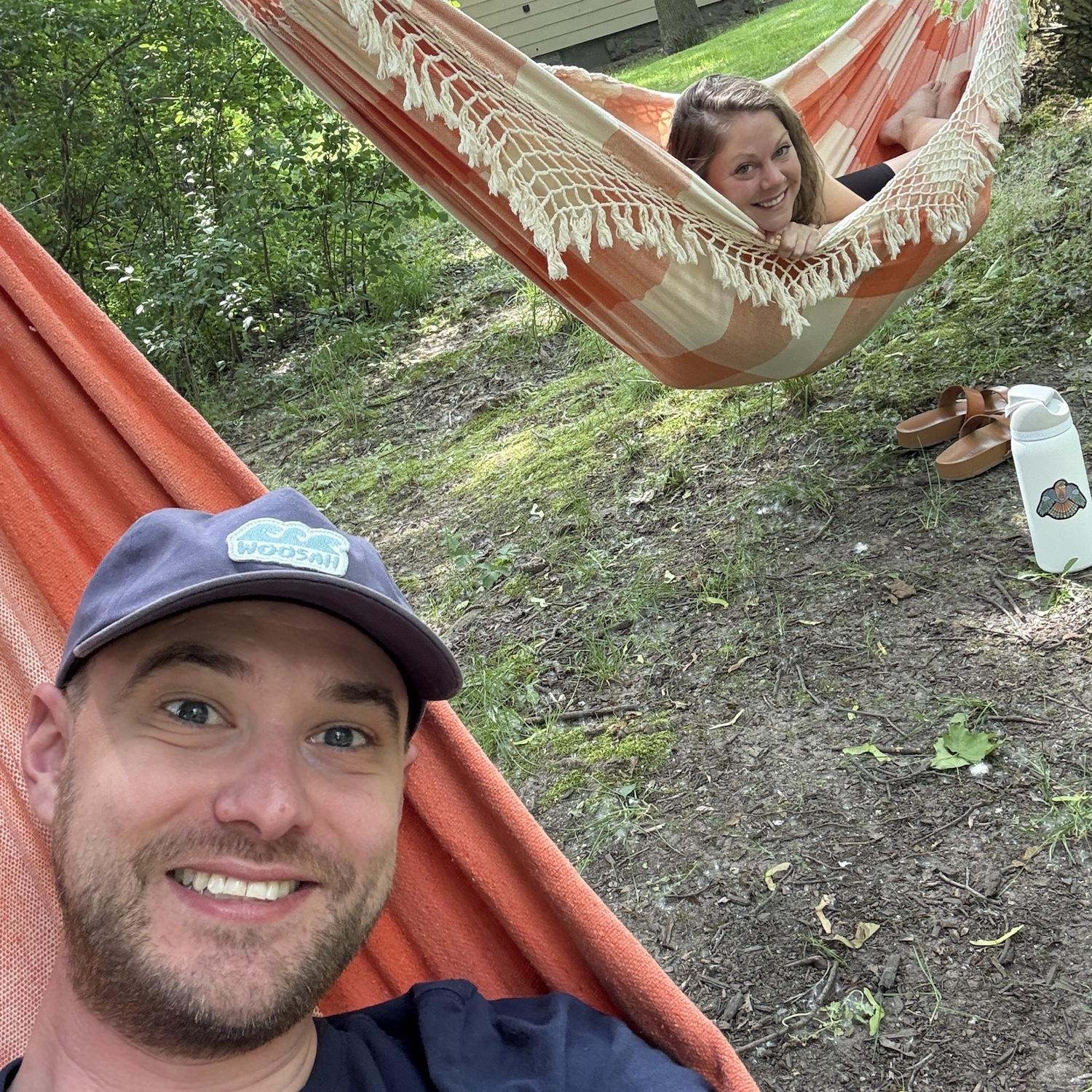Relaxing in our backyard hammocks