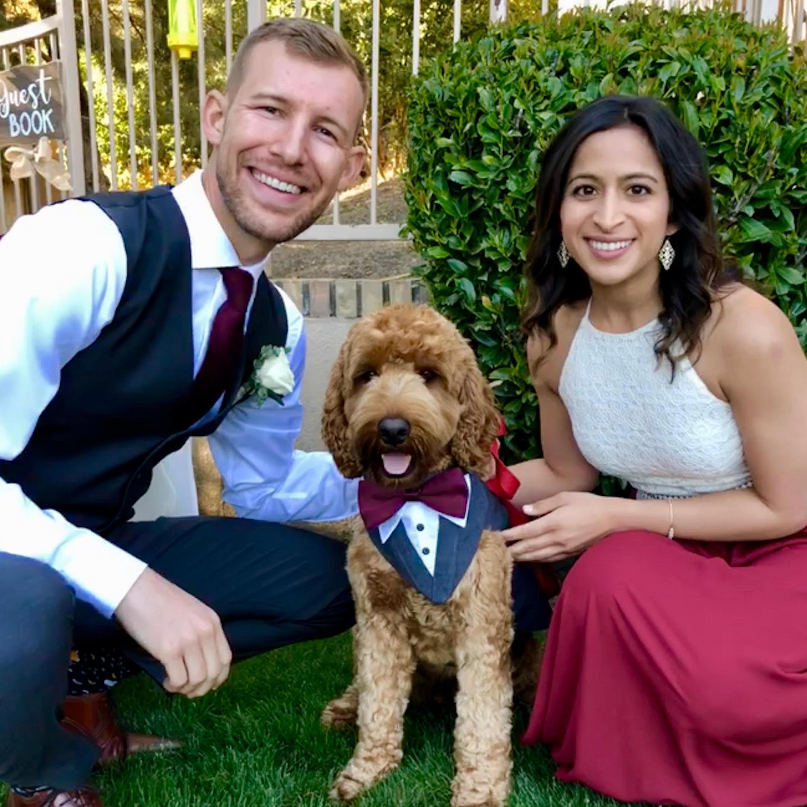 Can you tell these two love their furry friends? Here's the couple with the Miller's family pup (Bryce's other brother).