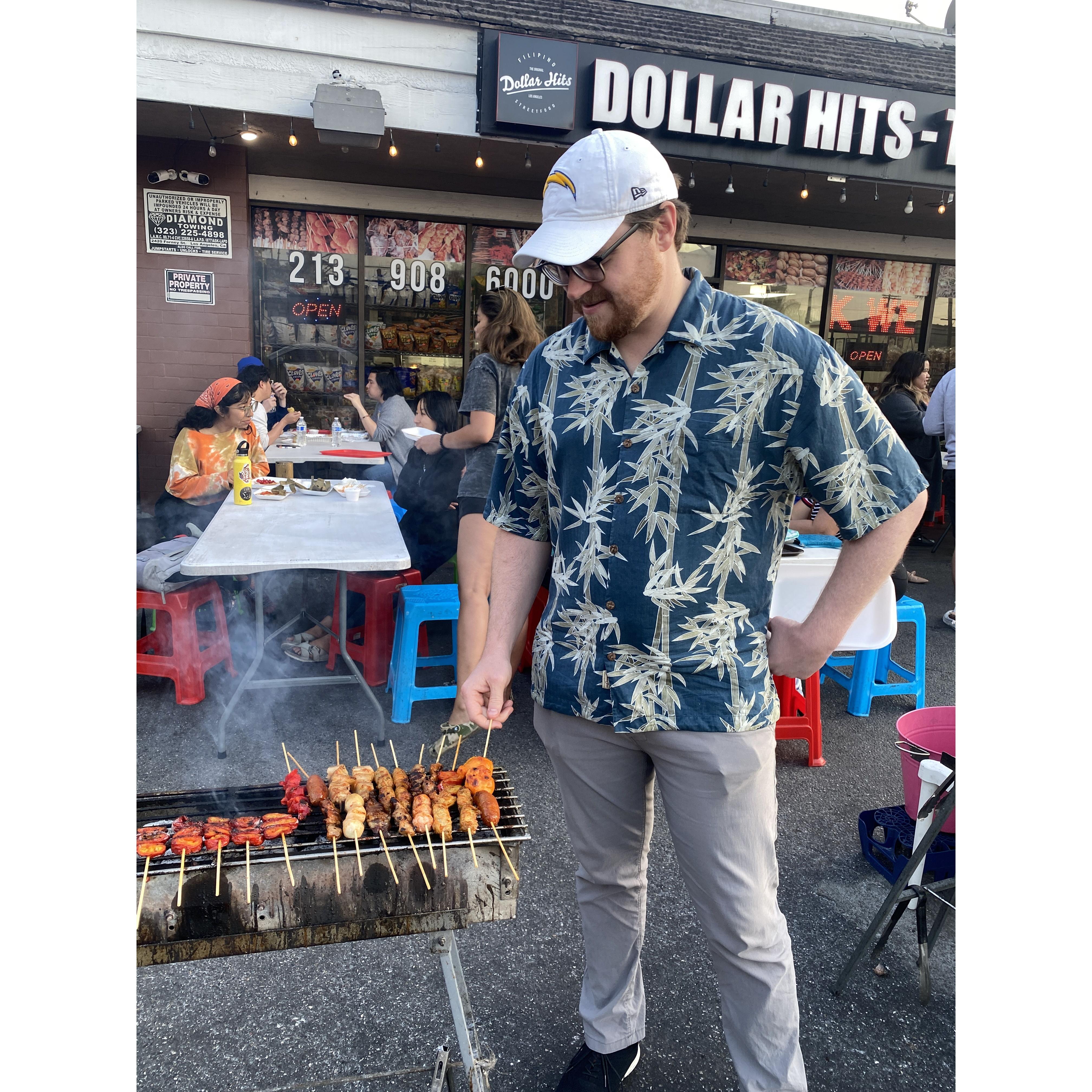Daniel working the grill at Dollar Hits, a popular Filipino street food joint in Historic Filipinotown, LA.