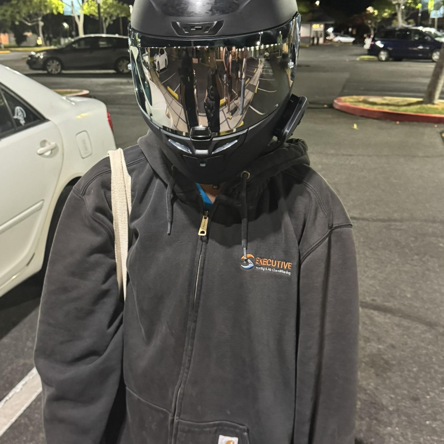Trying on Jonah’s motorcycle helmet… while we still friends