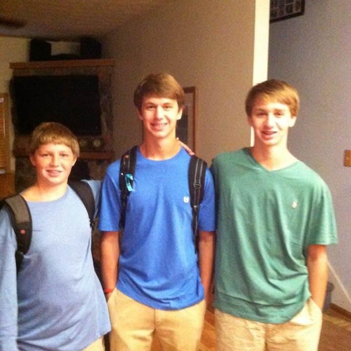 Zach (right) and his two brothers