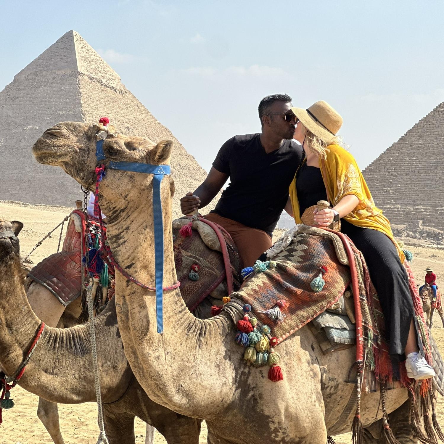Visiting the pyramids on our Egypt vacation.