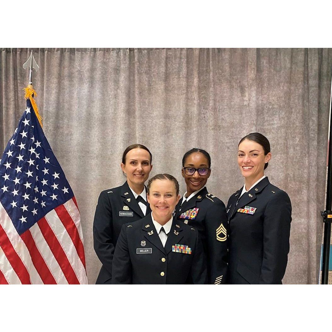 Kristin and her friends graduating from Warrant Officer Candidate School, 2022.