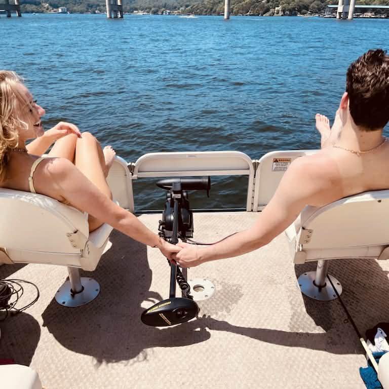 This picture captures the quiet, steady love that anchors our relationship. It’s just the two of us, holding hands and soaking in the peace of the water.