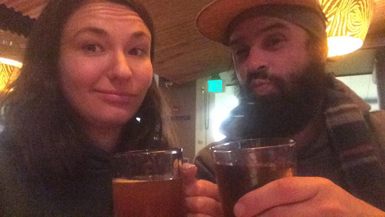 Traveling delays require funny faces and a couple of beers :)