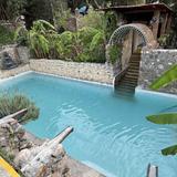 Visit the Hot Springs (La Gruta or Escondido Place)