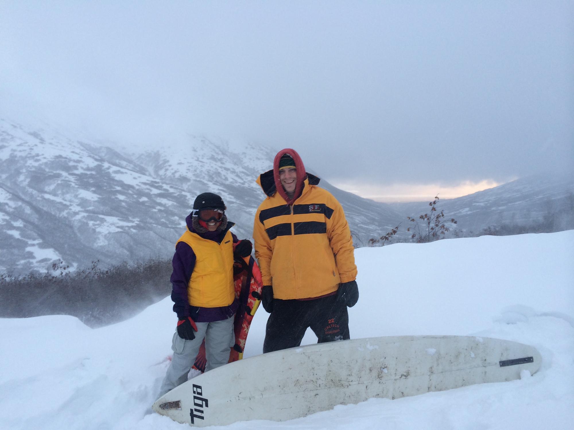 Sledding on a surfboard at Hatcher Pass