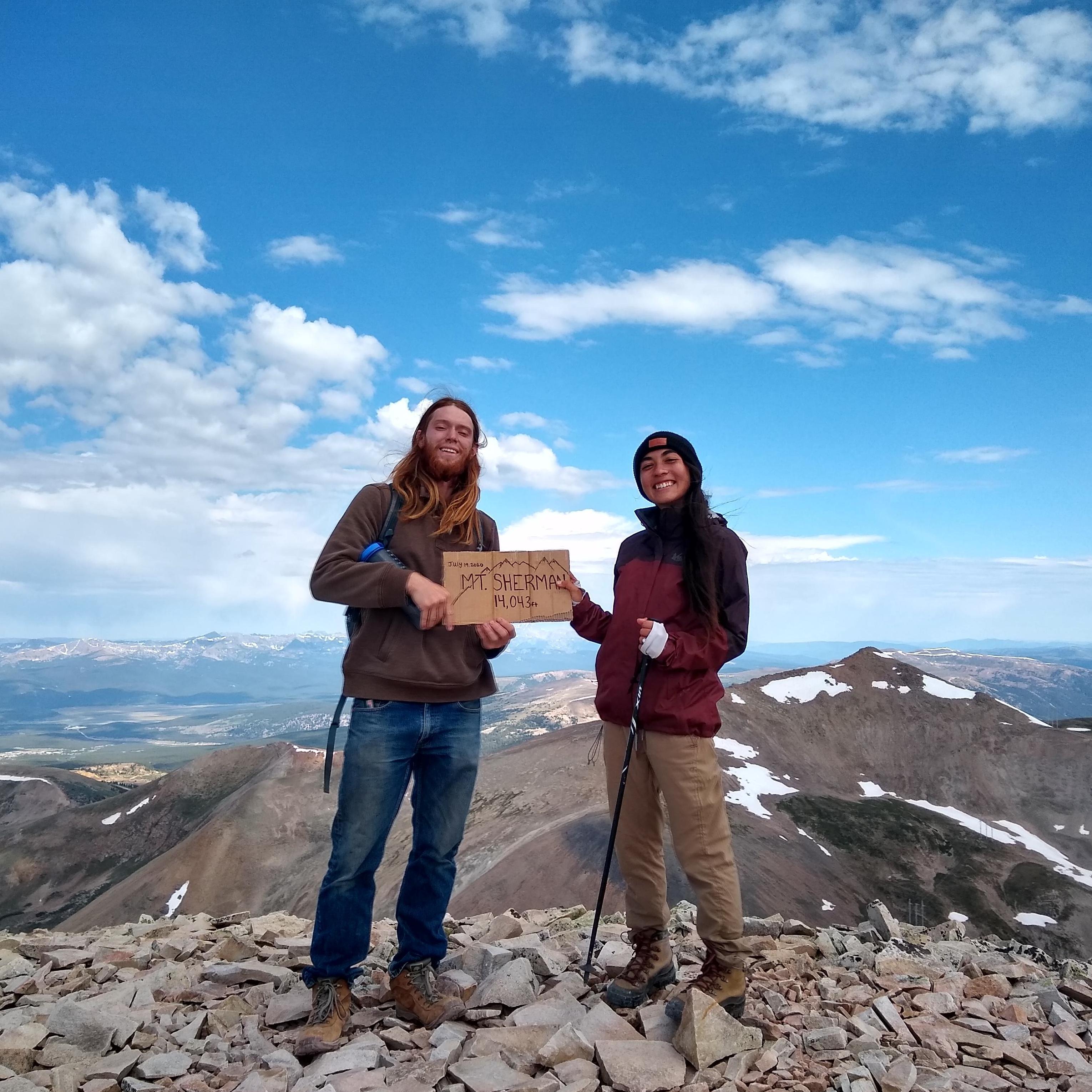 Another 14er down! Happy faces at the top of Mount Sherman last summer.