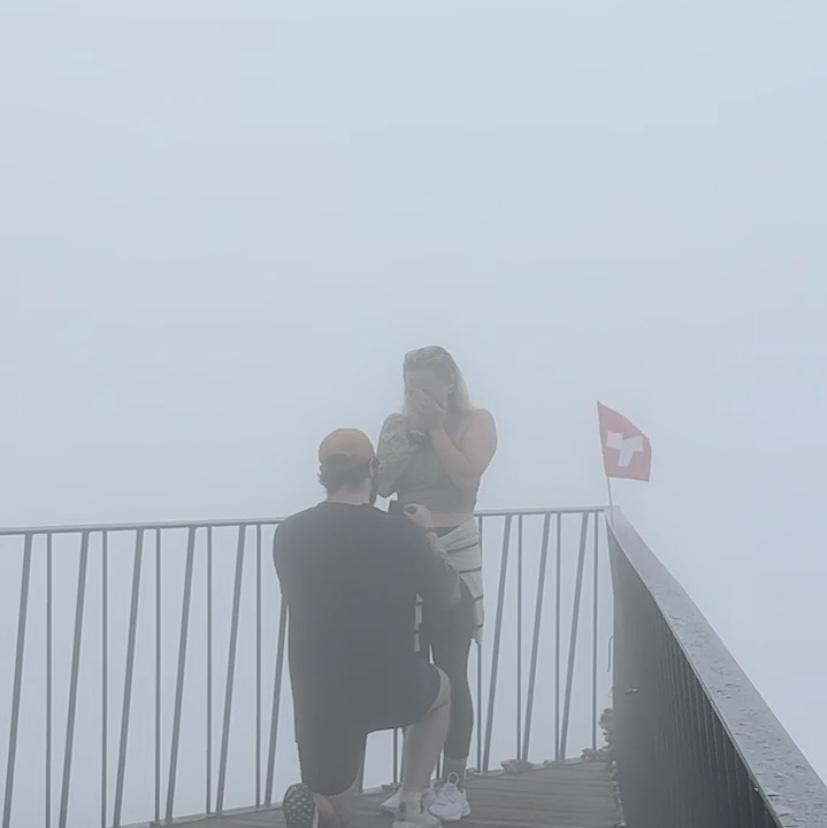Meredith said YES to Sam in a cloud atop the Harder Kulm in Interlaken, Switzerland!
