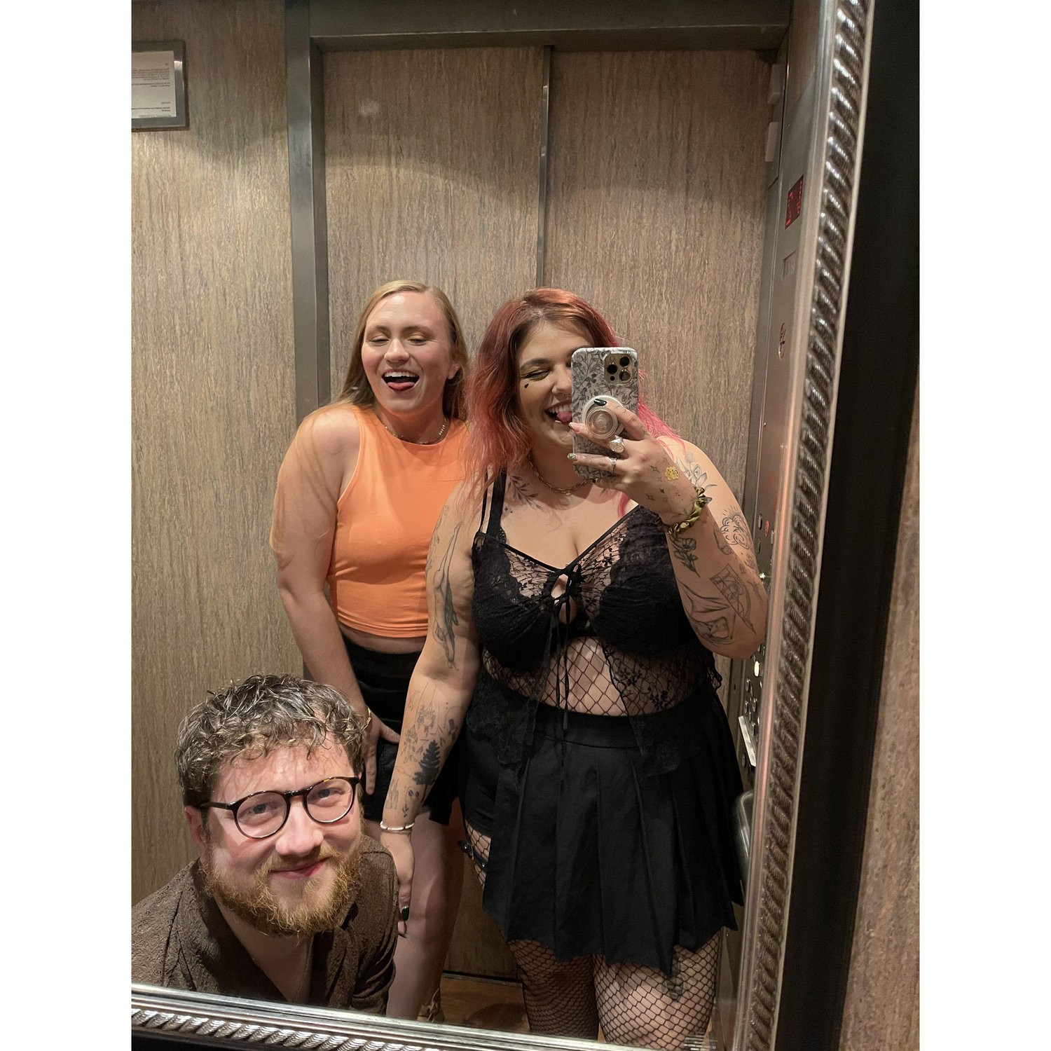 I was tying my shoelace in the lift, before we hit the streets of SF for a night out that left us at an afters in a flat with a terrace overlooking downtown SF. Shelby's face says it all.