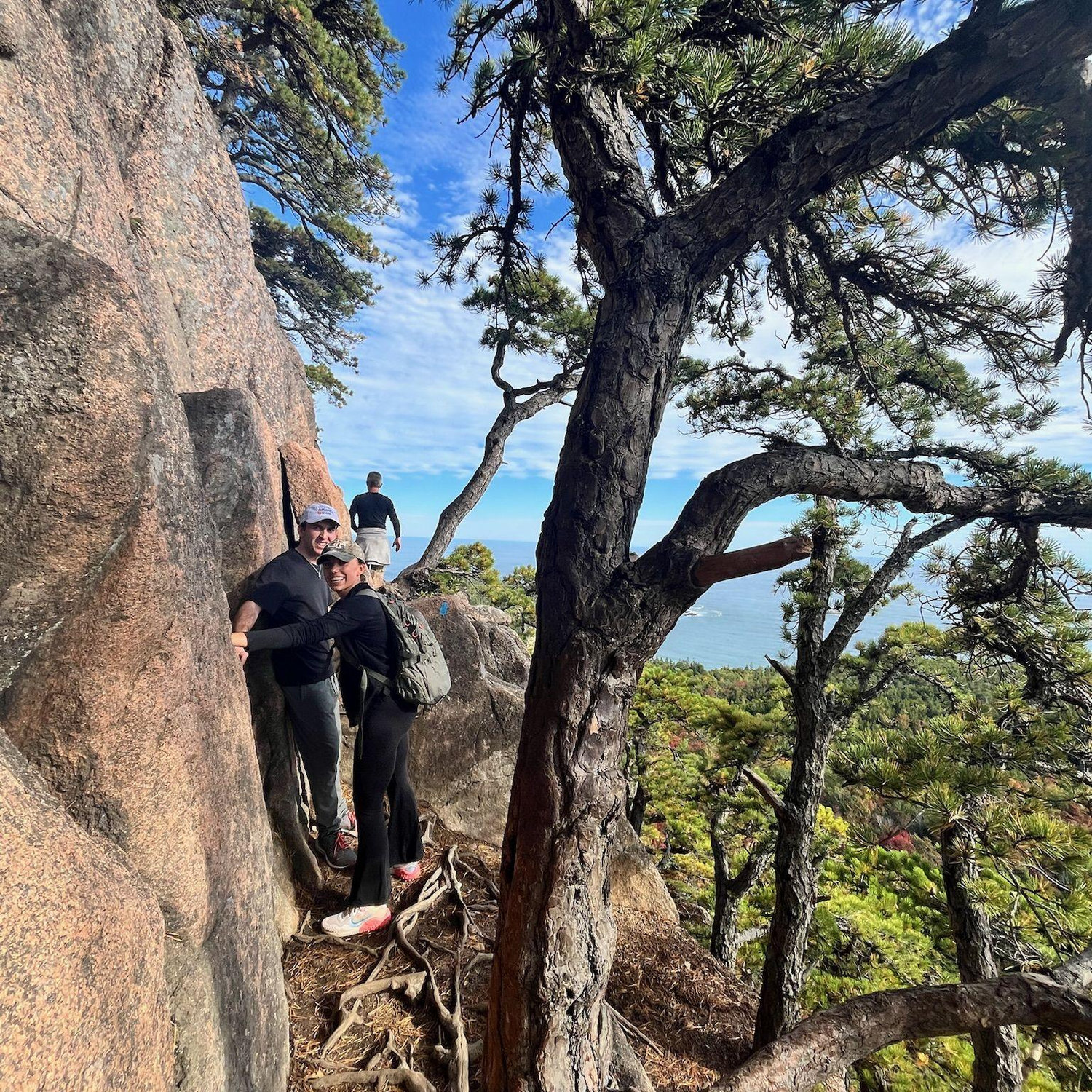 In Maine, Britt learned Alison's fear of heights and how to kindly push her up the mountain!
