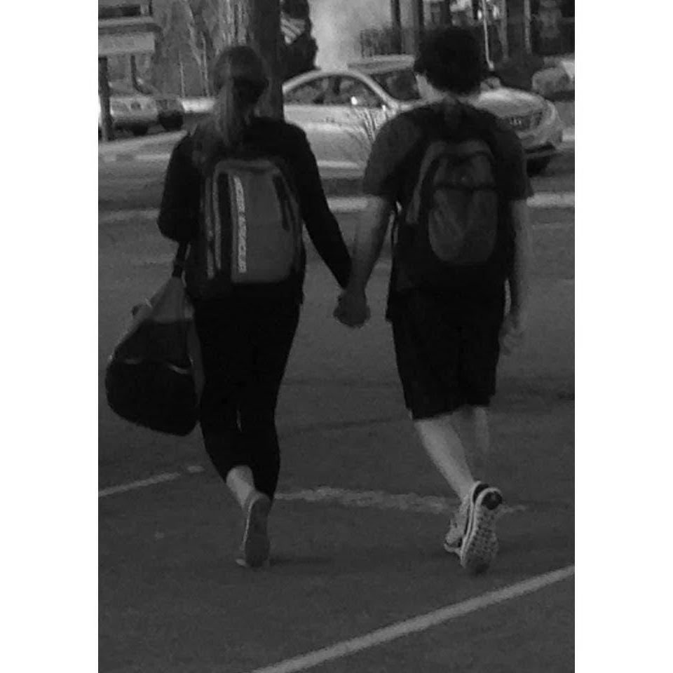 Our first picture together after dating, leaving TJ's baseball game.
